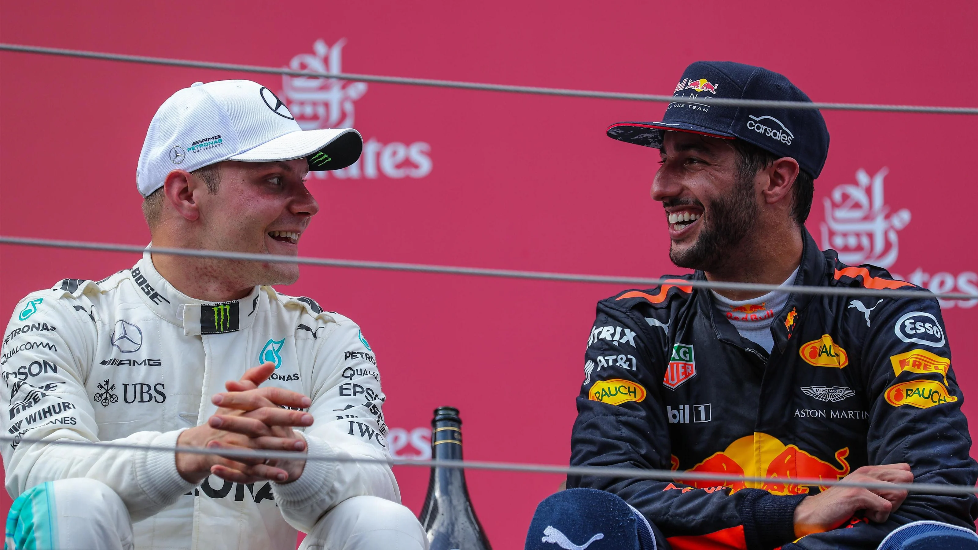 race winner Valtteri Bottas (FIN) Mercedes AMG F1 and Daniel Ricciardo (AUS) Red Bull Racing