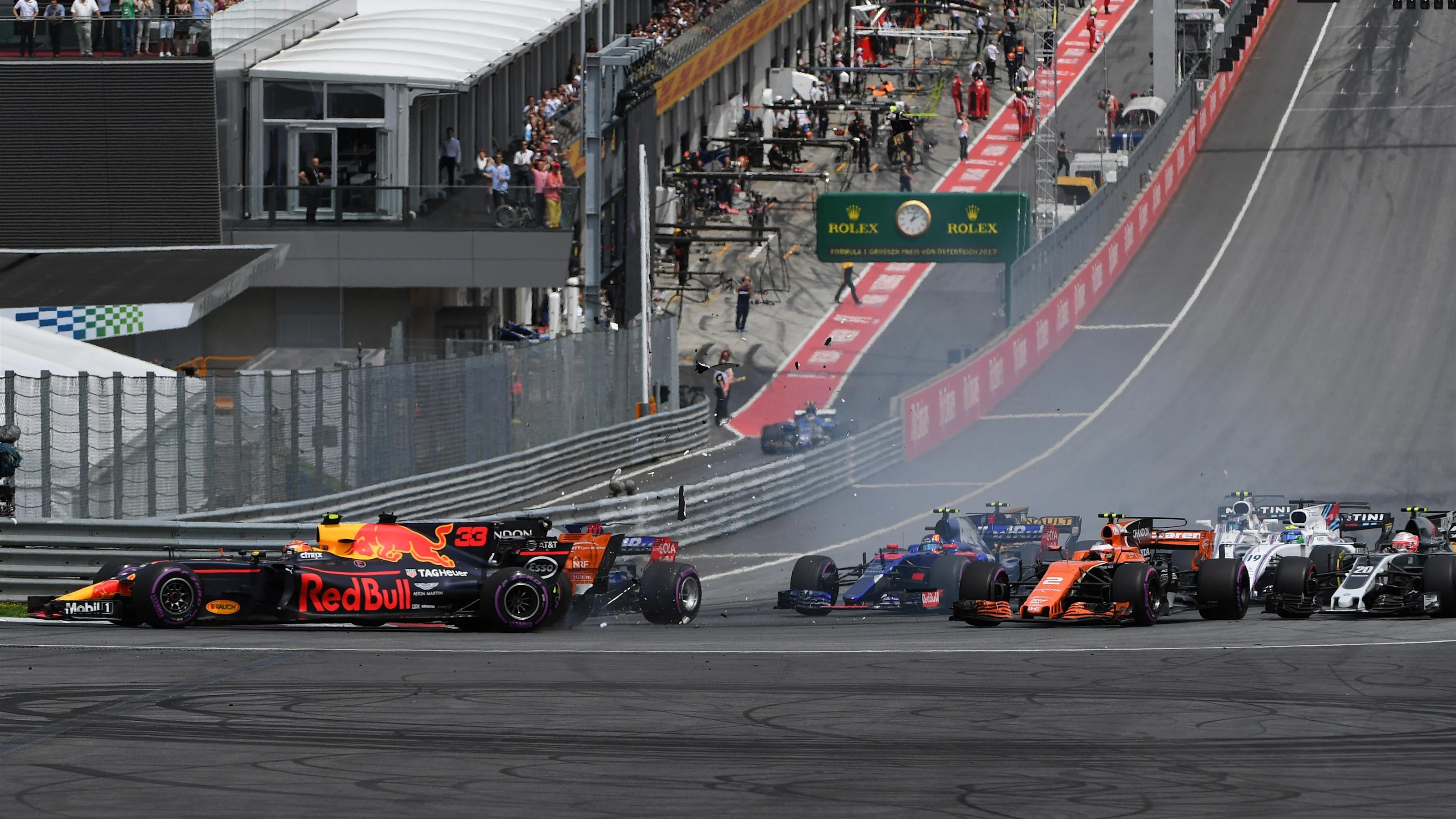 Max Verstappen (NED) Red Bull Racing RB13 collides at the start of the race at Formula One World