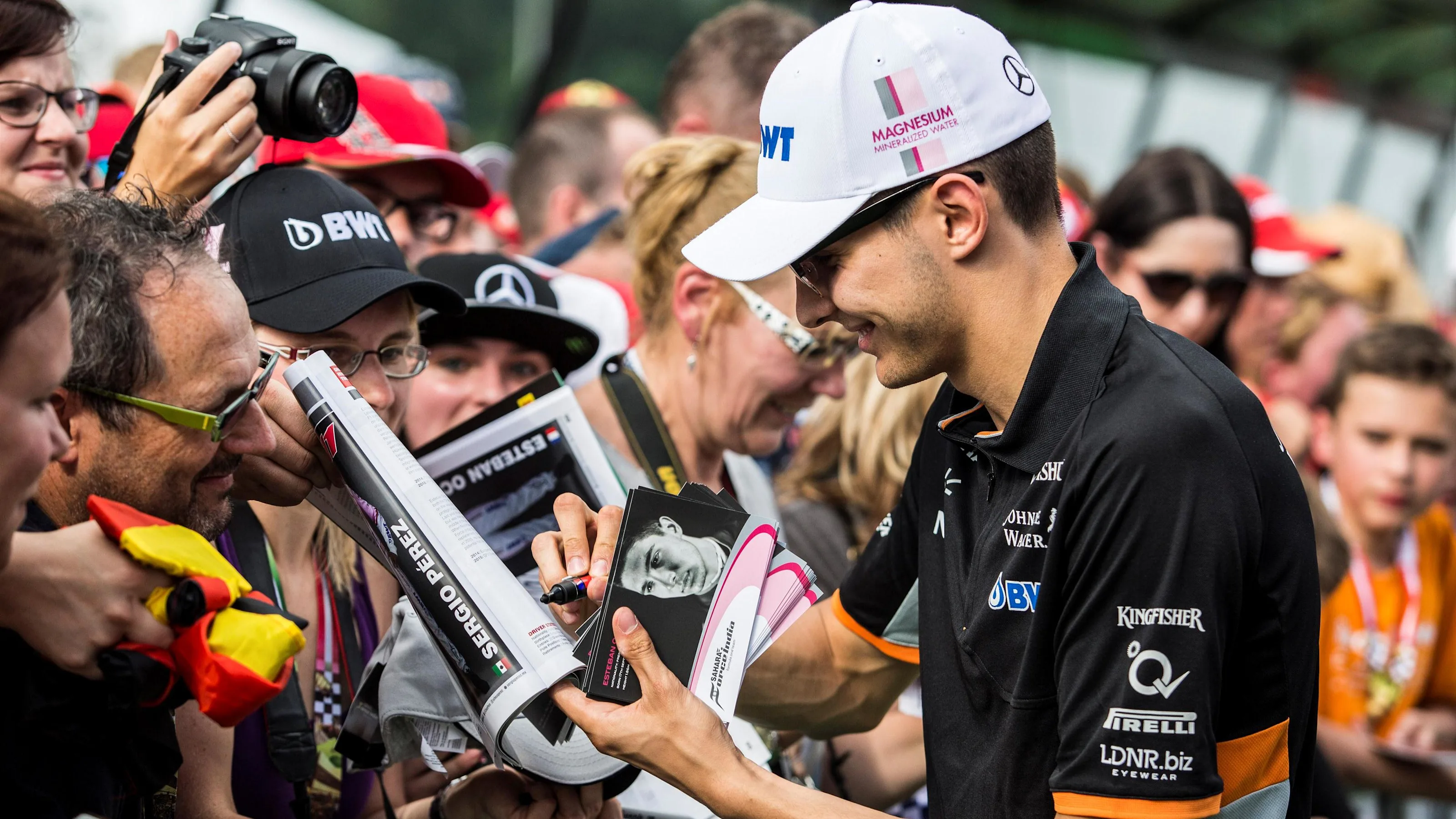 Esteban Ocon (FRA) Force India F1 signs autographs for the fans at Formula One World Championship,