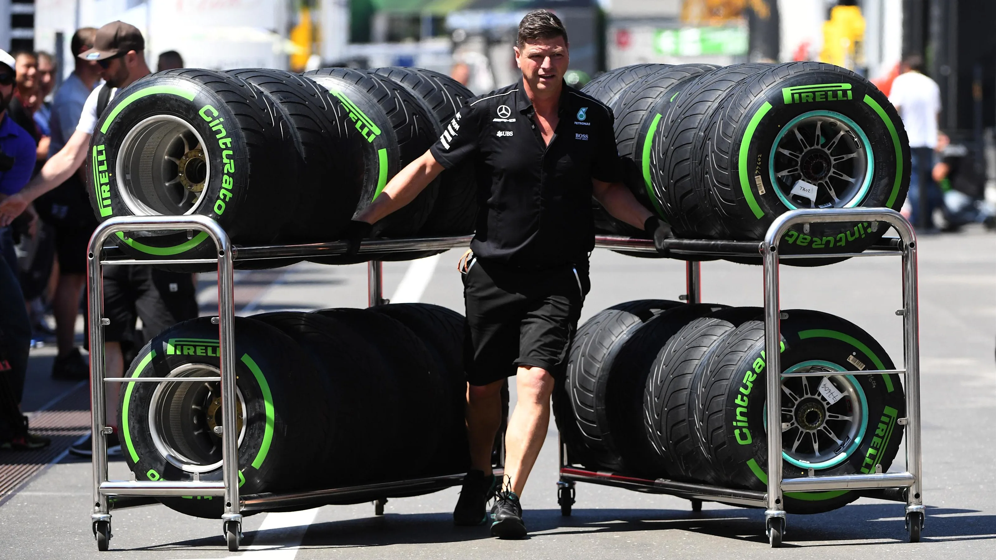 Mercedes AMG F1 mechanic and Pirelli tyres at Formula One World Championship, Rd9, Austrian Grand