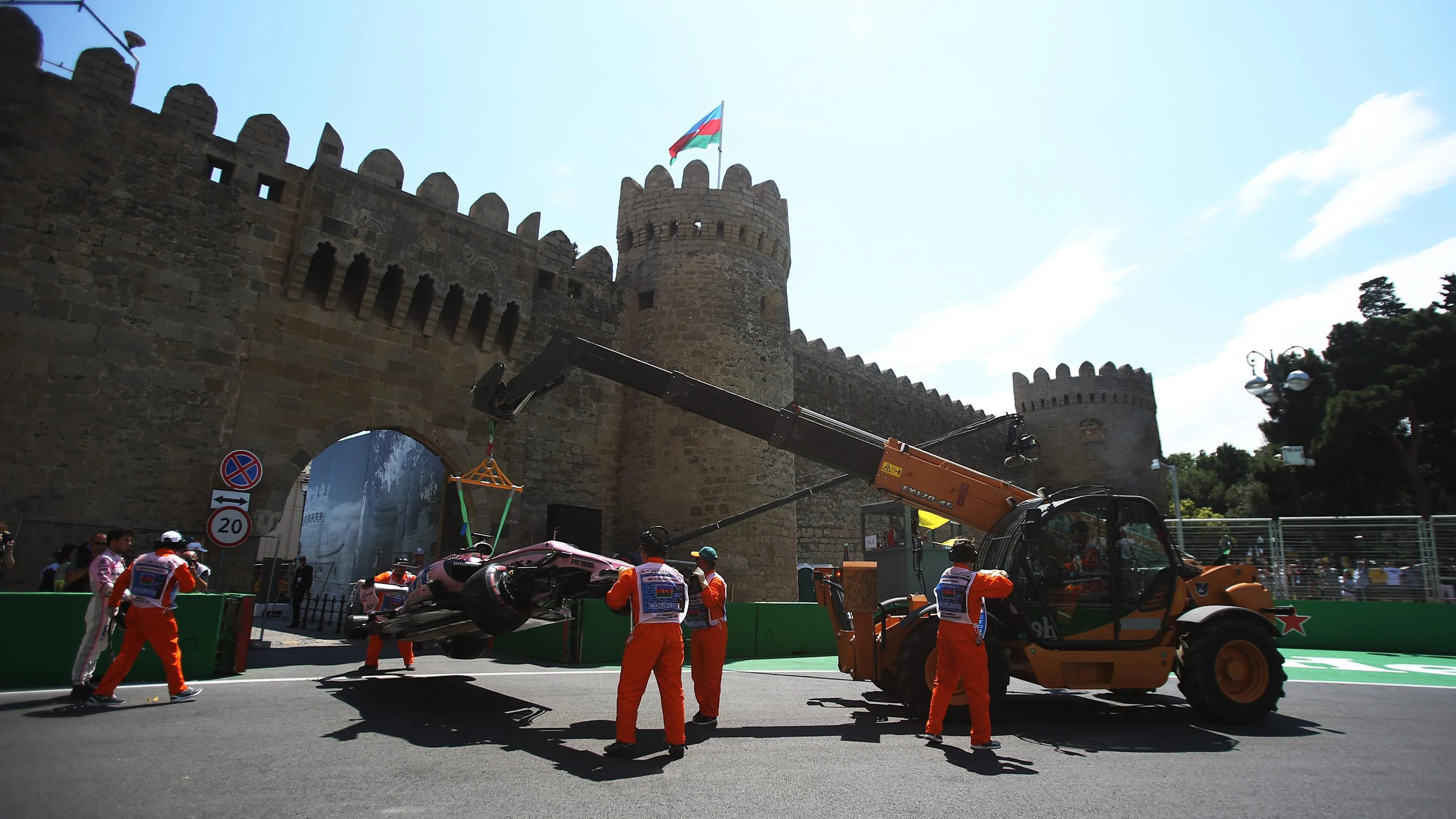 The crashed car of Sergio Perez (MEX) Force India VJM10 is recovered in FP1 at Formula One World
