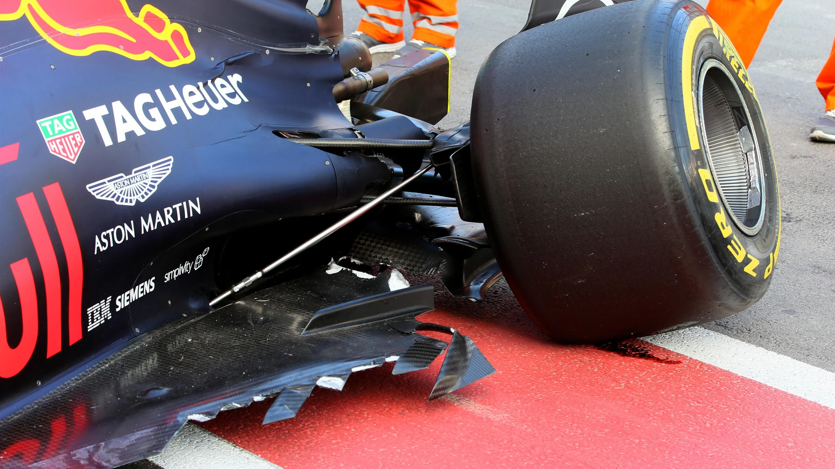 The crashed car of Max Verstappen (NED) Red Bull Racing RB13 is recovered after FP2 at Formula One