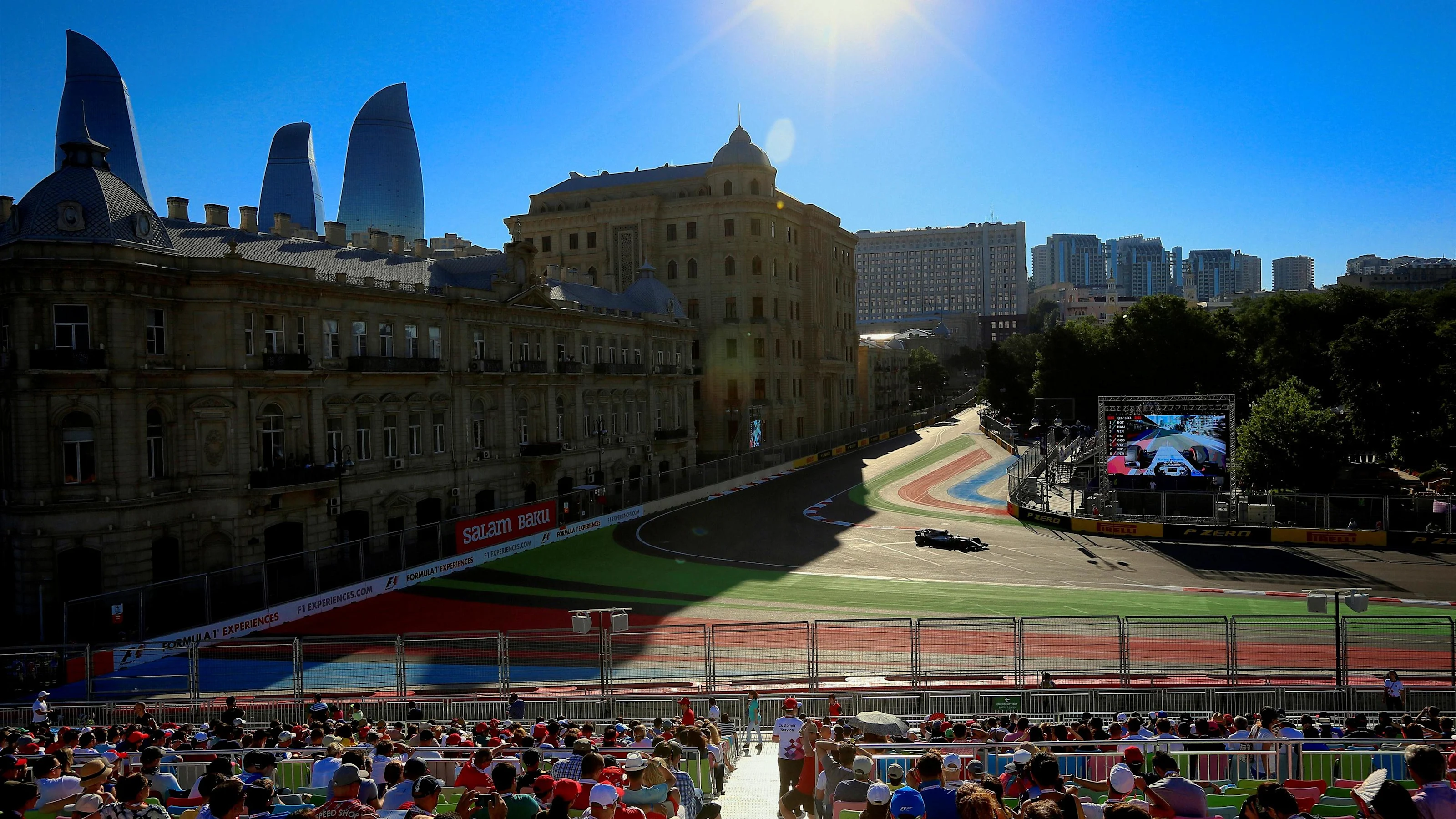 Fans in the grandstand observe Valtteri Bottas (FIN) Mercedes-Benz F1 W08 Hybrid at Formula One
