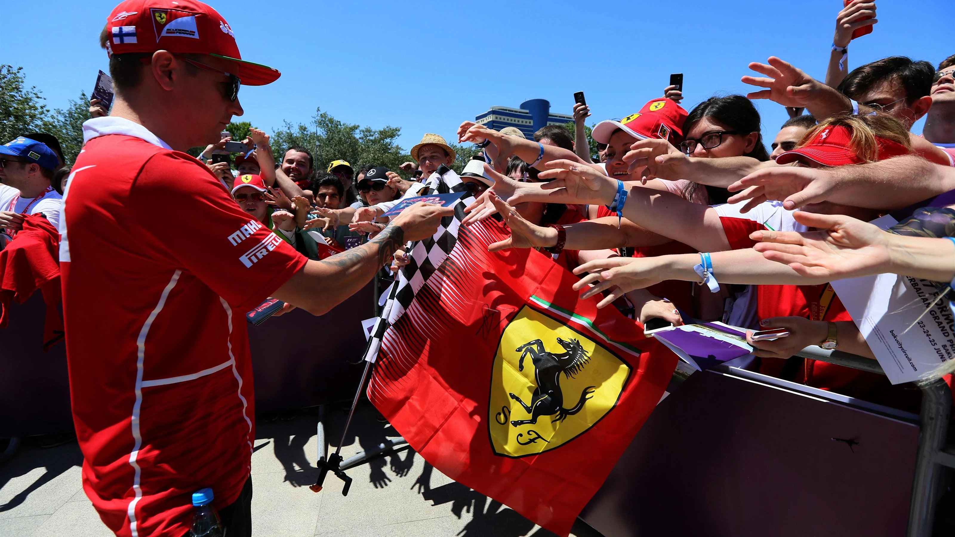 Kimi Raikkonen (FIN) Ferrari signs autographs for the fans at Formula One World Championship, Rd8,