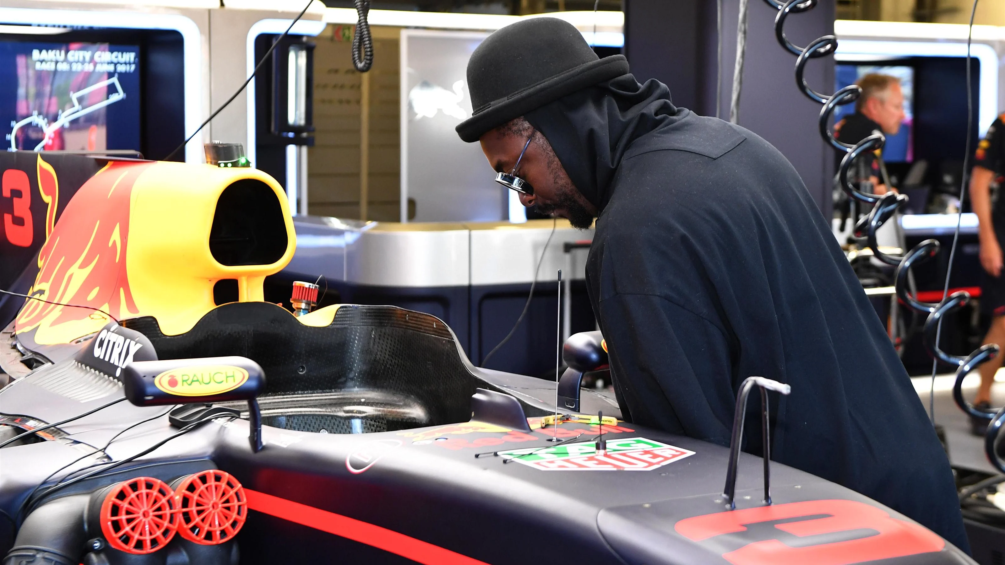William James Adams aka Will.I.Am (USA) Black Eyed Peas Musician observes the Red Bull Racing RB13