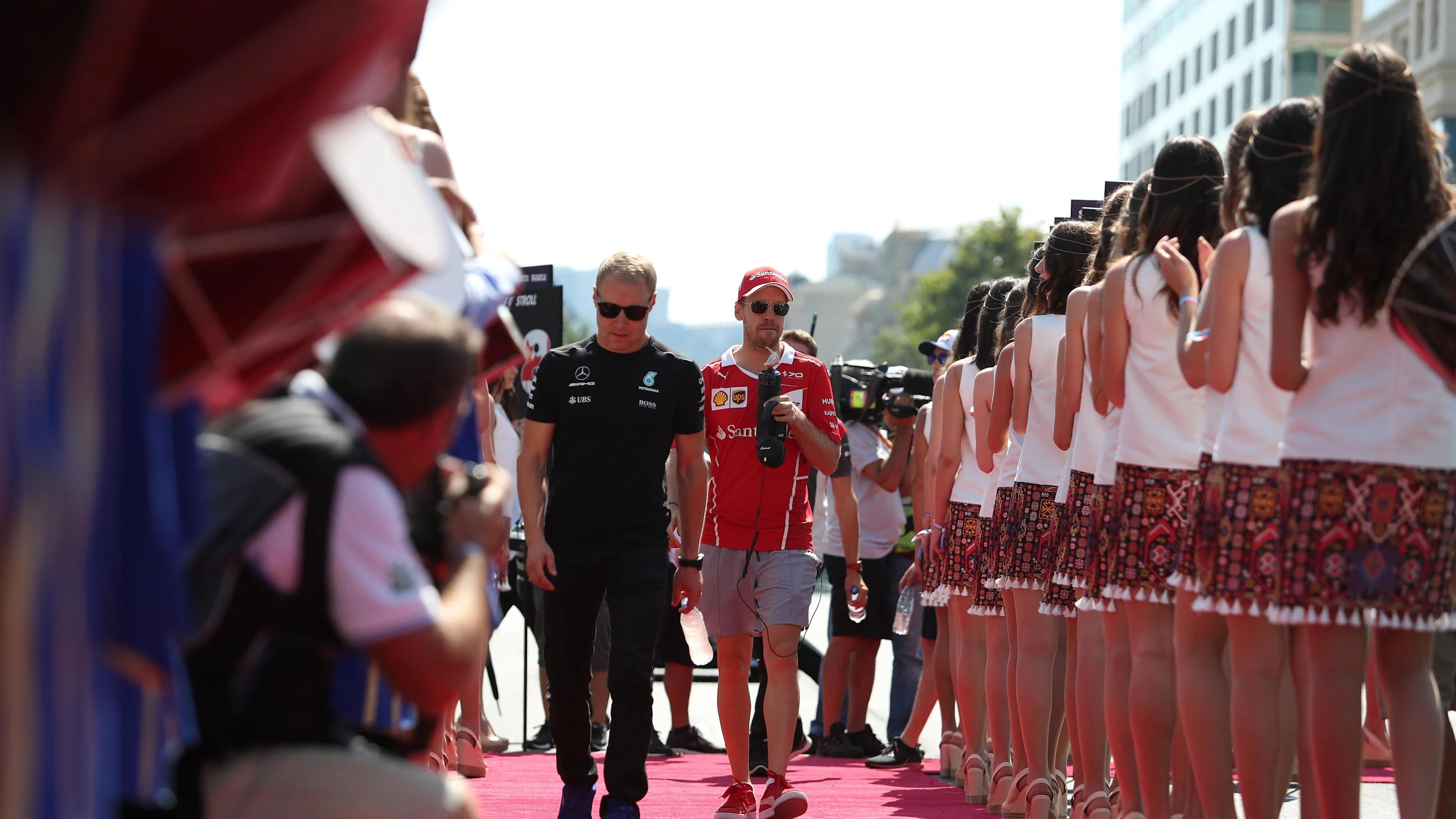 Valtteri Bottas (FIN) Mercedes AMG F1 and Sebastian Vettel (GER) Ferrari on the drivers parade at