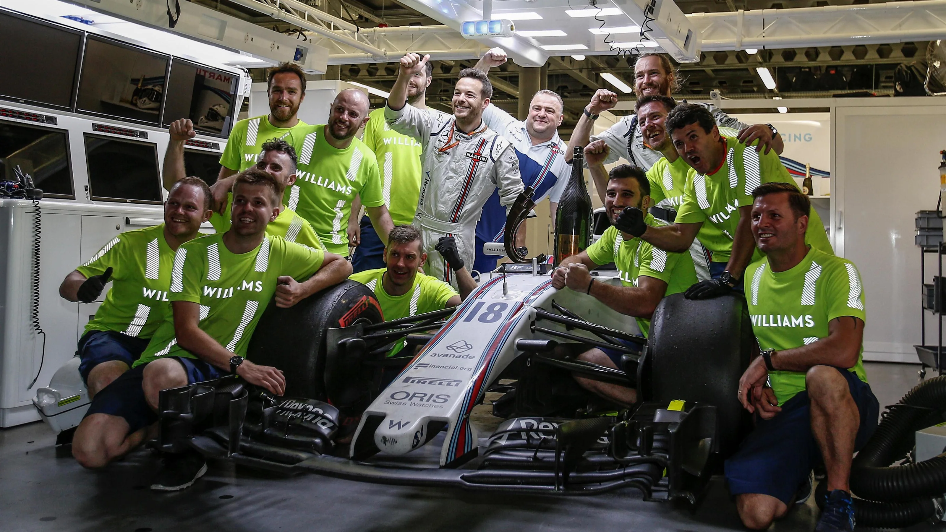 Williams mechanics celebrate with the champagne and car of third placed Lance Stroll (CDN) Williams
