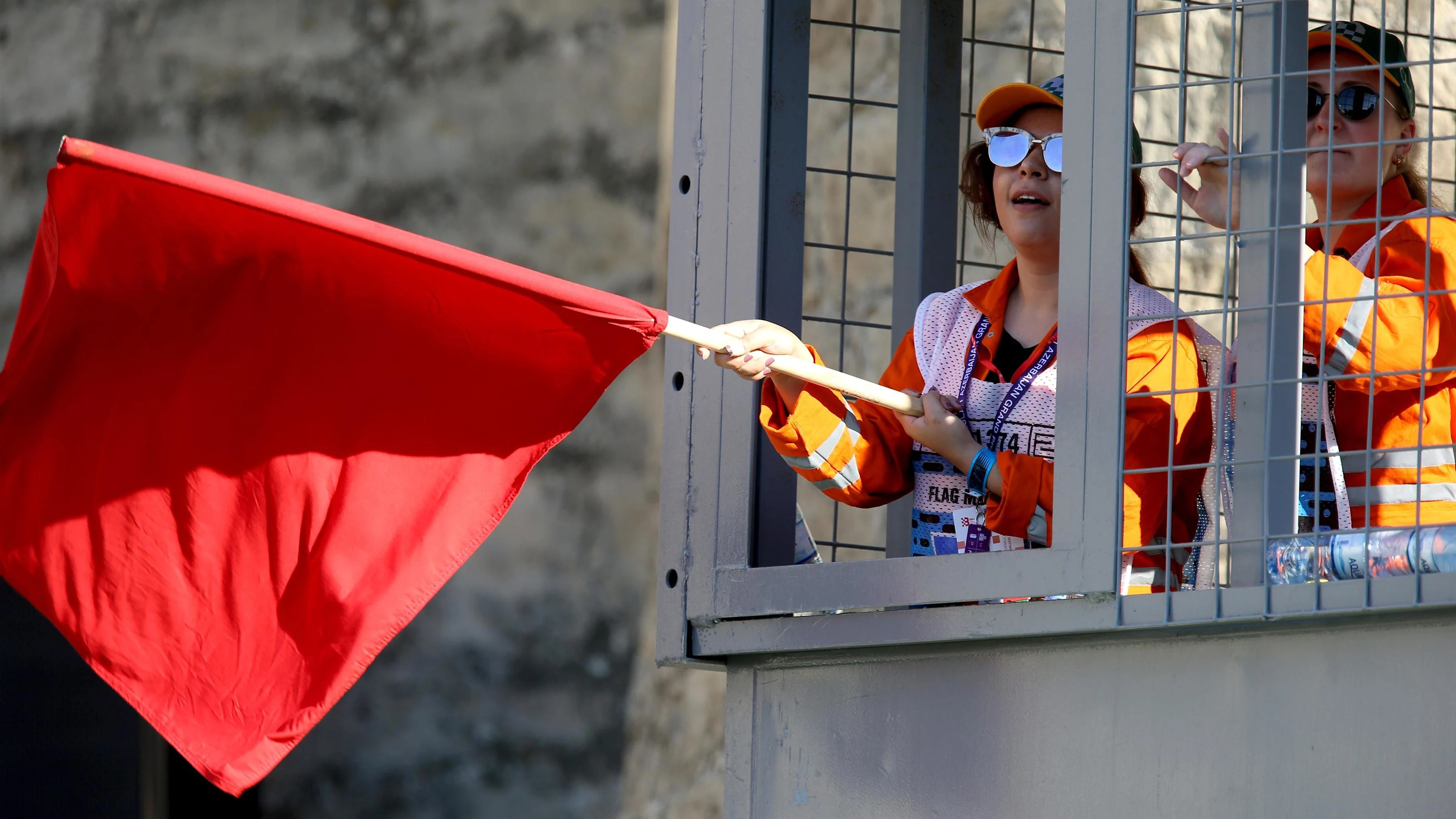 Marshal waves the red flag at Formula One World Championship, Rd8, Azerbaijan Grand Prix, Race,