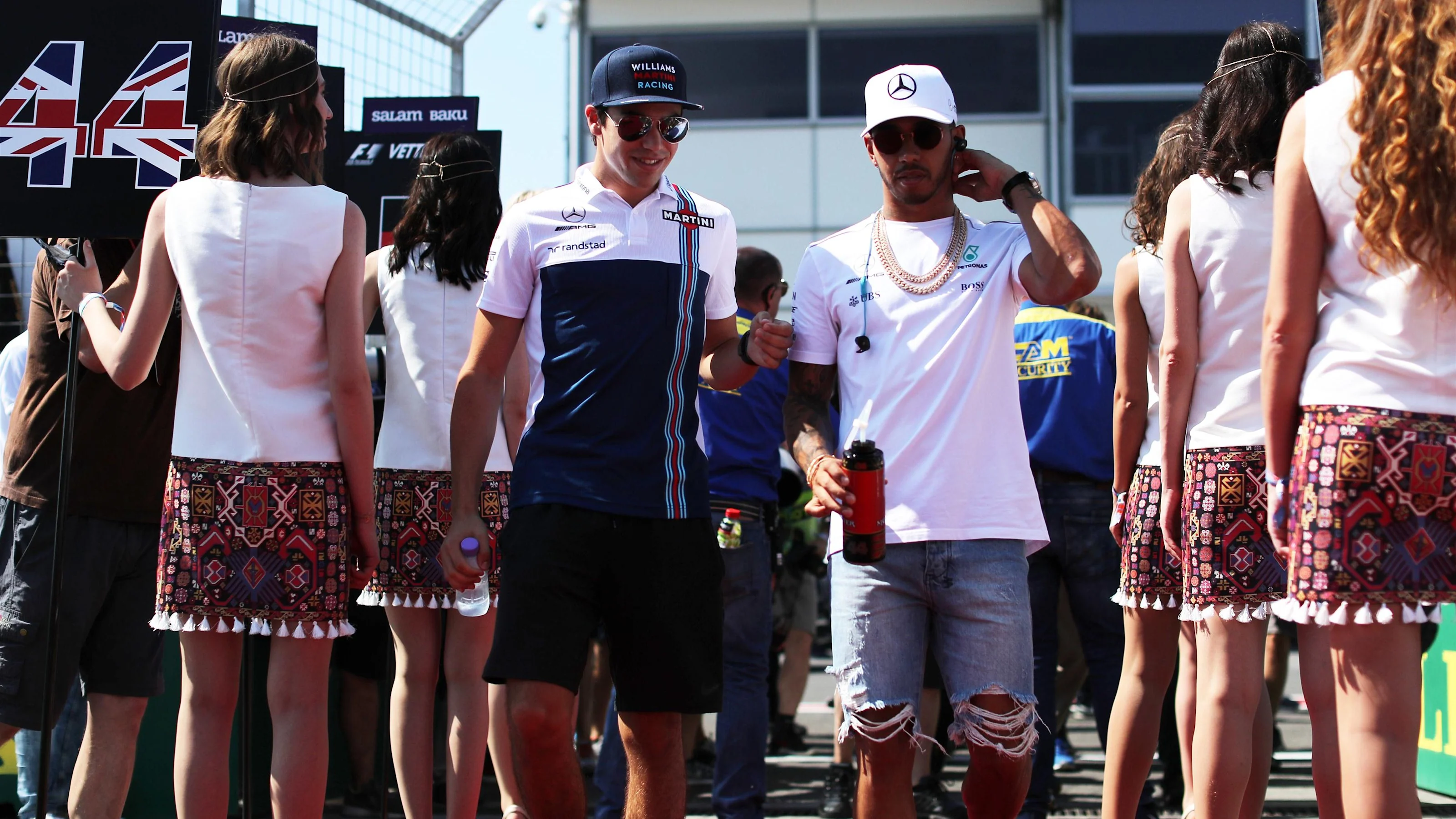 Lance Stroll (CDN) Williams and Lewis Hamilton (GBR) Mercedes AMG F1 on the drivers parade at