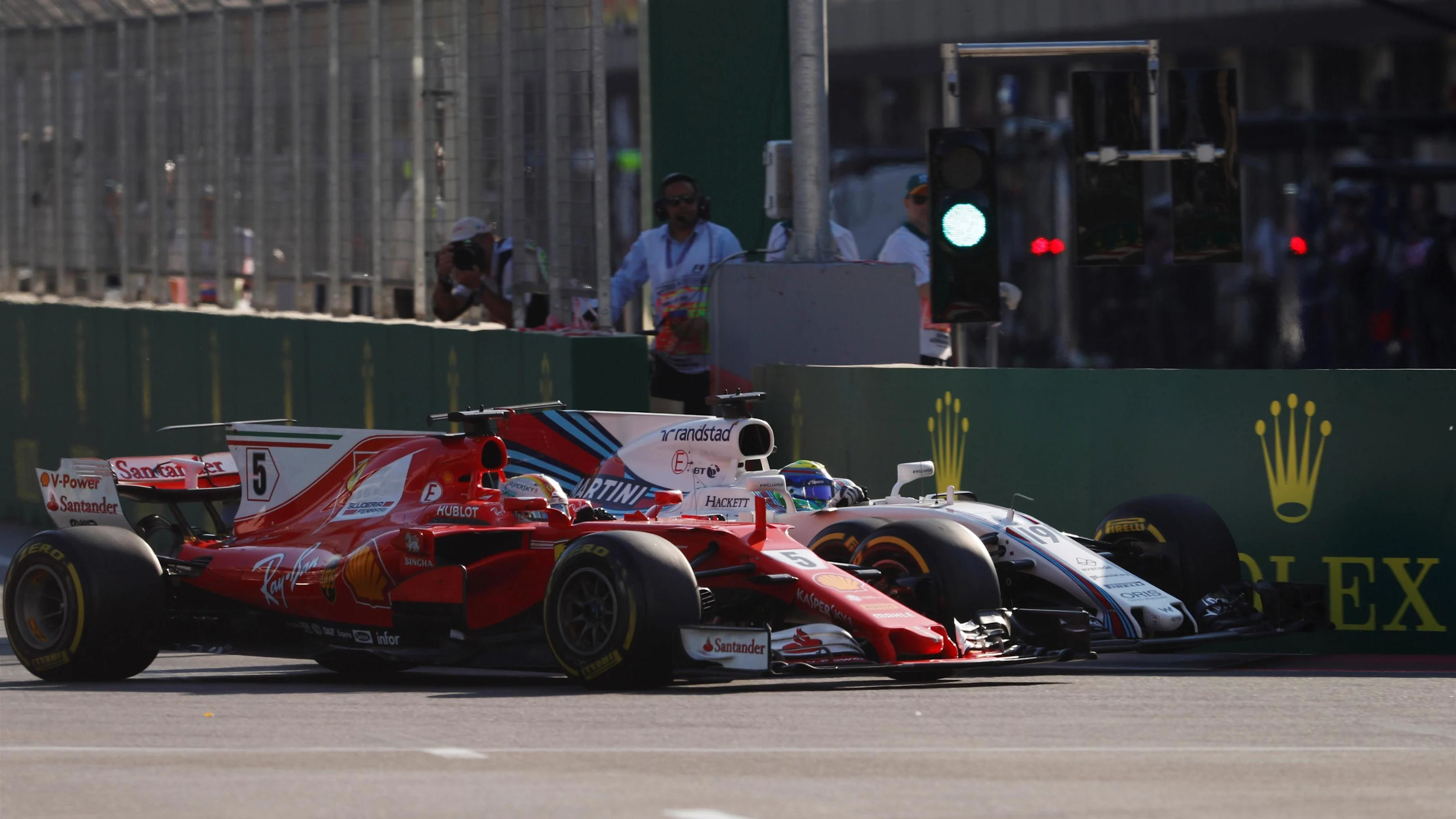 Felipe Massa (BRA) Williams FW40 and Sebastian Vettel (GER) Ferrari SF70-H battle at Formula One