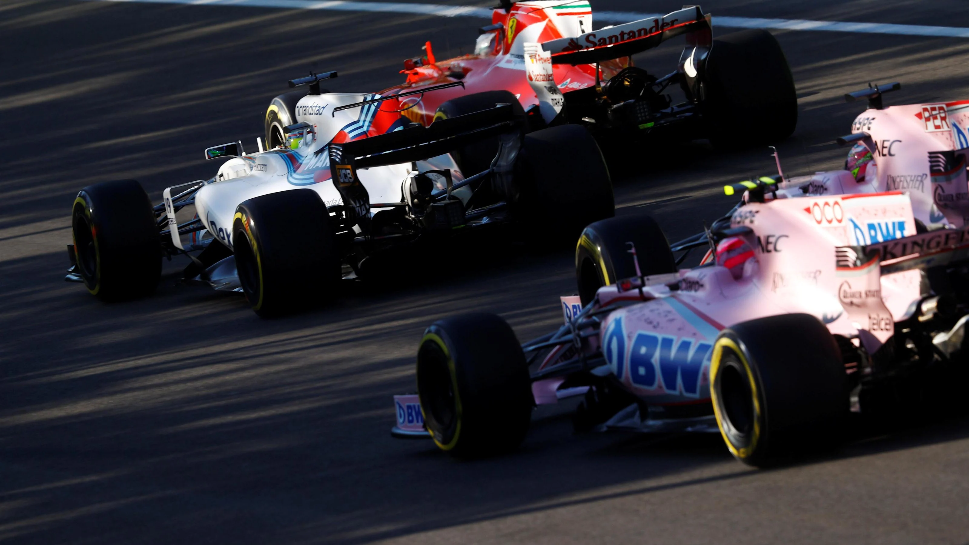 Sebastian Vettel (GER) Ferrari SF70-H, Felipe Massa (BRA) Williams FW40, Esteban Ocon (FRA) Force