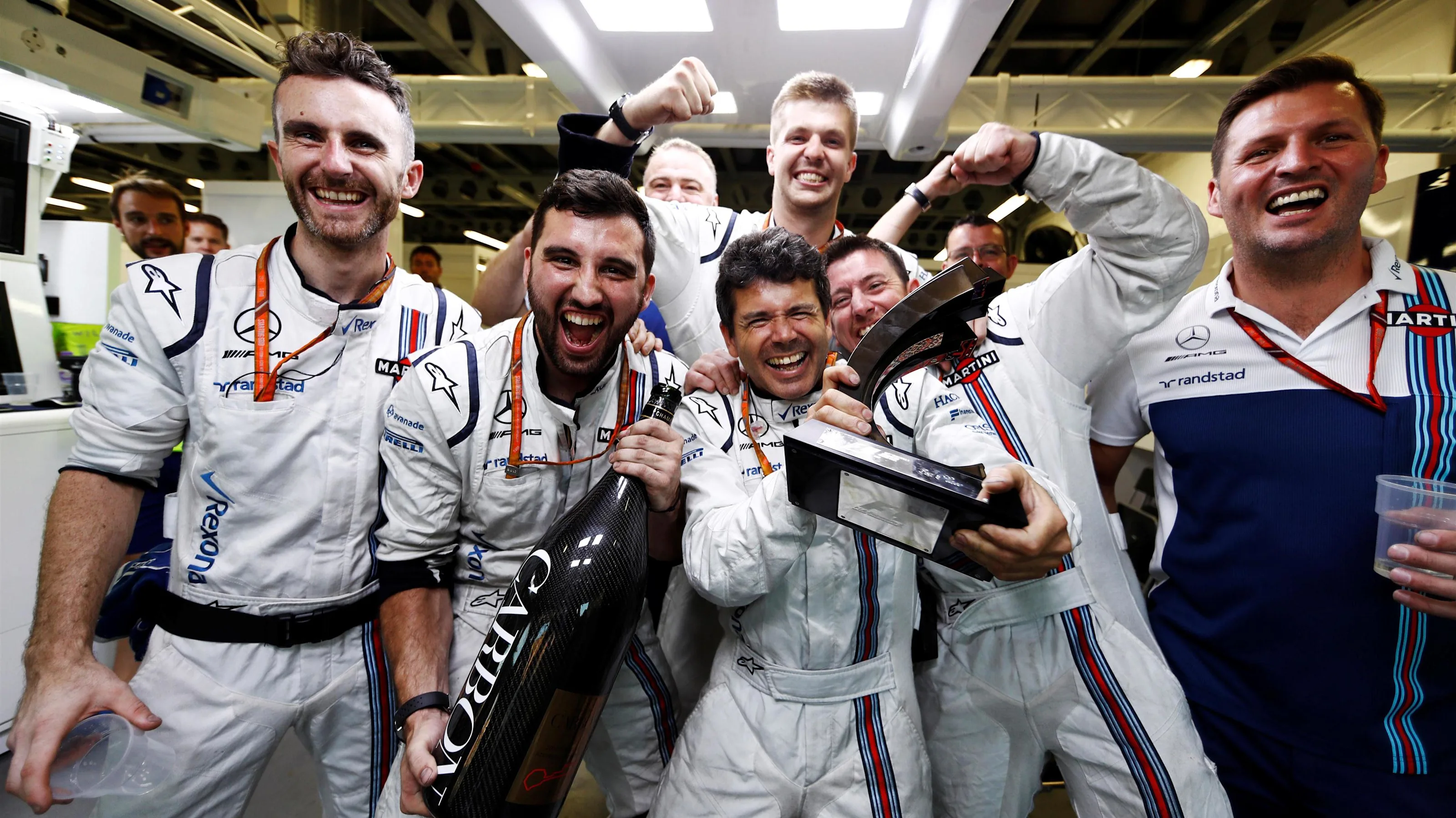 Williams mechanics celebrate third place in the garage at Formula One World Championship, Rd8,