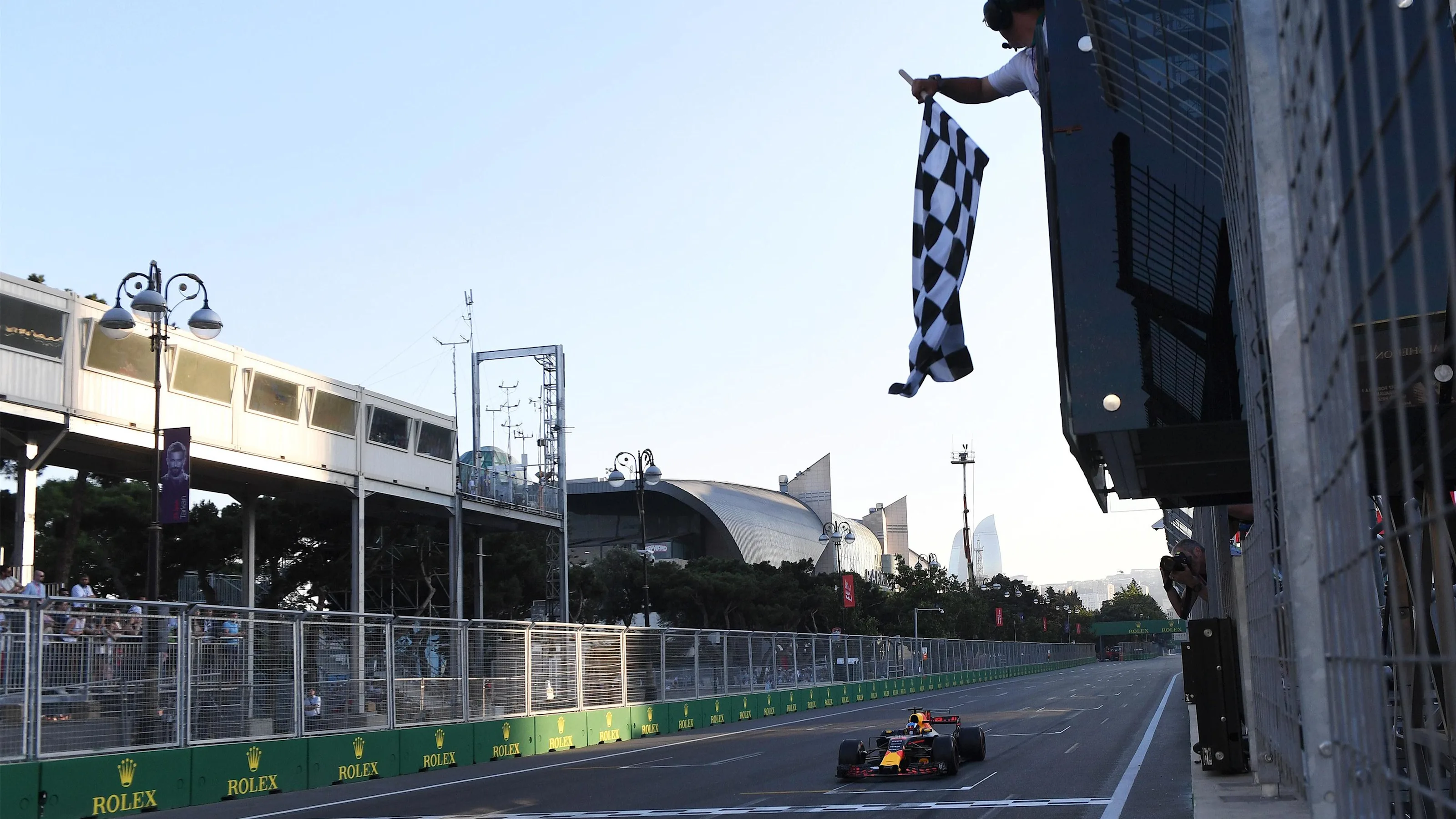Race winner Daniel Ricciardo (AUS) Red Bull Racing RB13 takes the chequered flag at Formula One