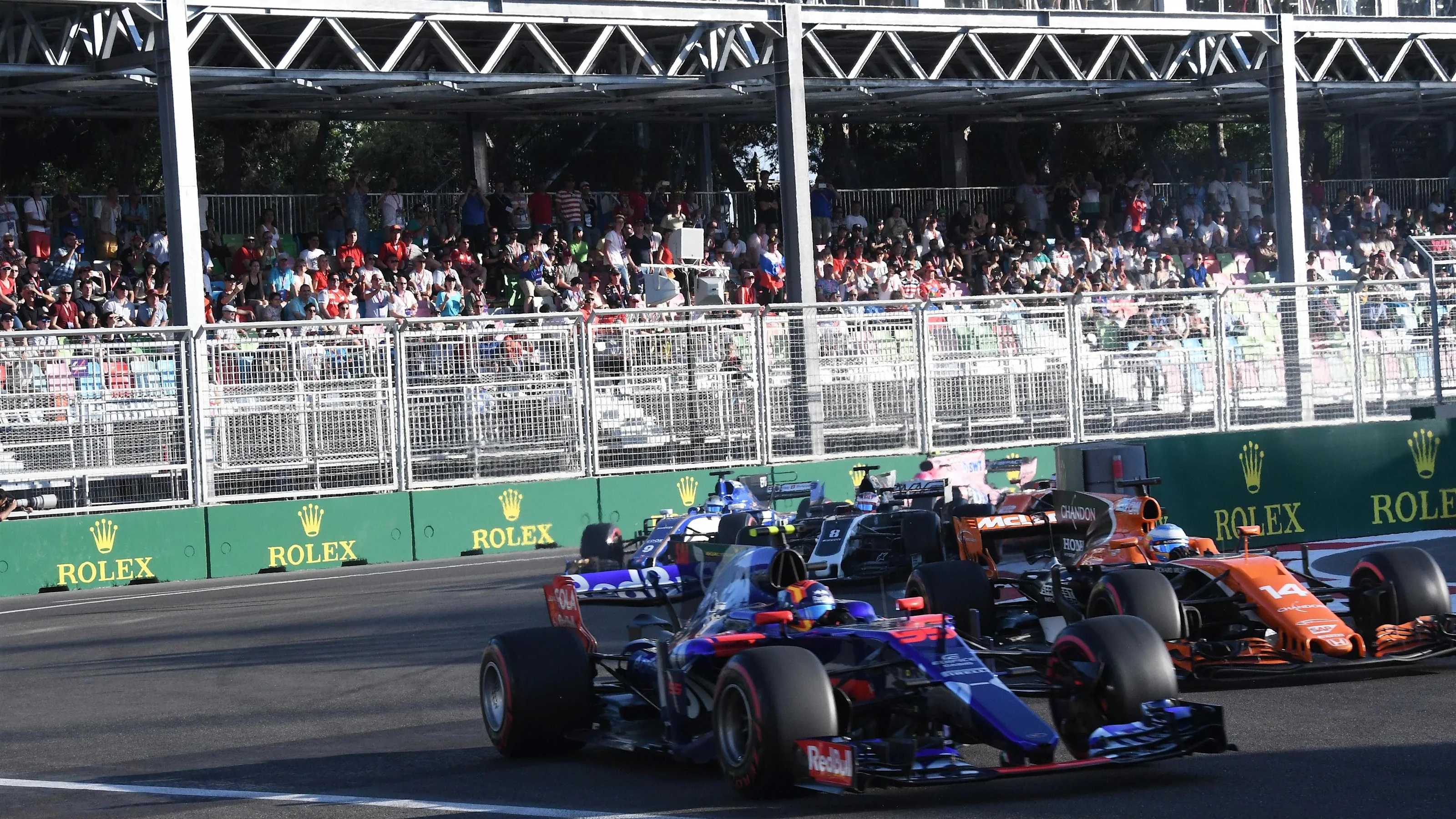 Daniil Kvyat (RUS) Scuderia Toro Rosso STR12 and Carlos Sainz jr (ESP) Scuderia Toro Rosso STR12
