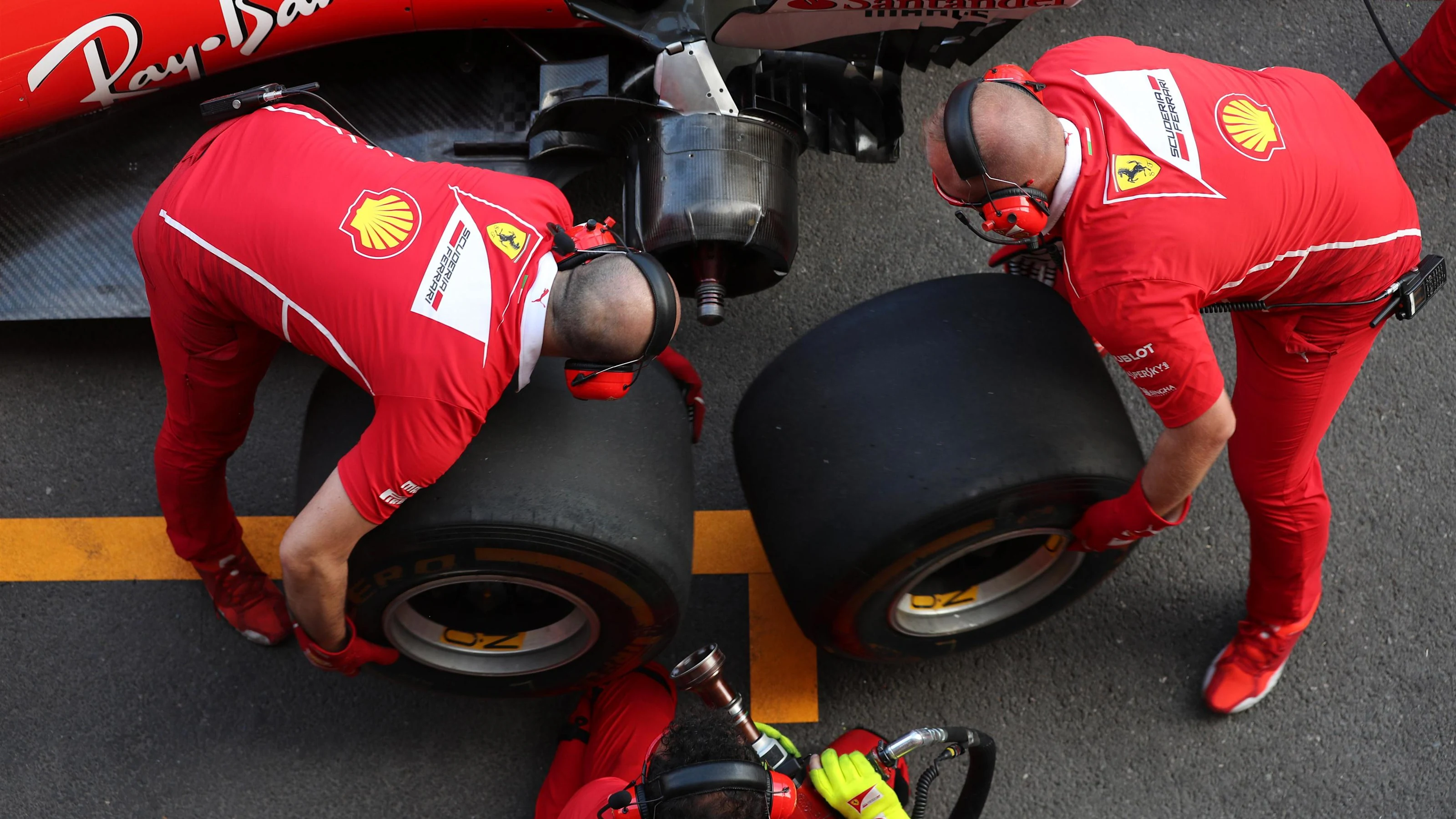 Ferrari mechanics make a practice pitstop at Formula One World Championship, Rd8, Azerbaijan Grand