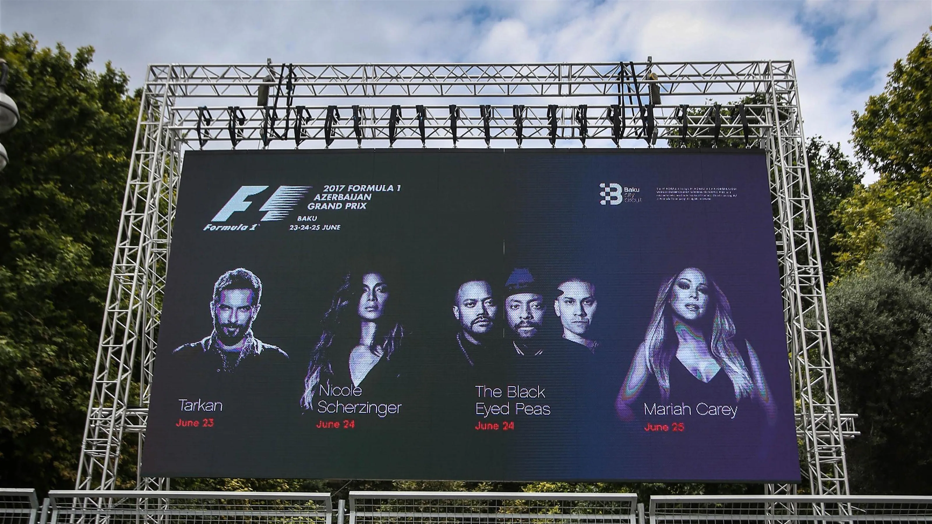 Concert advert on giant screen at Formula One World Championship, Rd8, Azerbaijan Grand Prix,