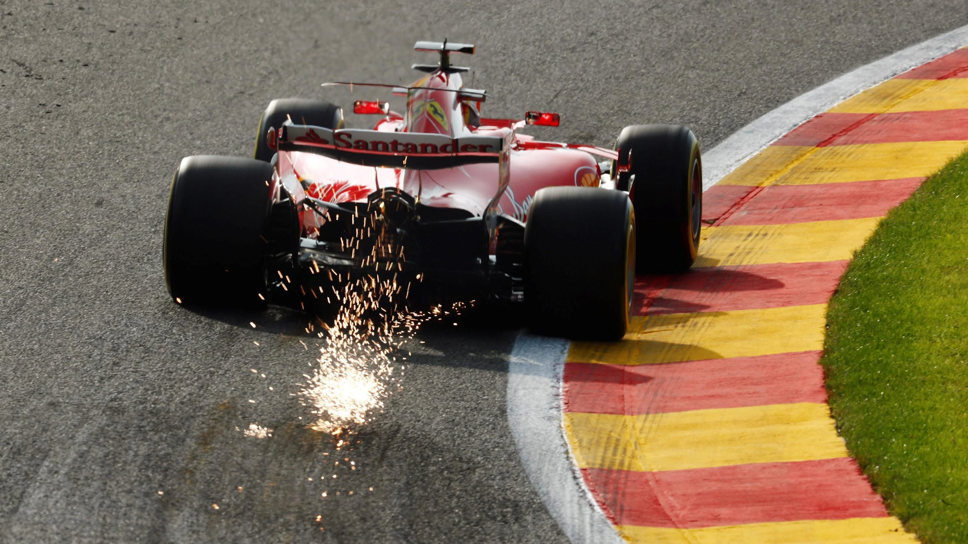 Sebastian Vettel (GER) Ferrari SF70-H sparks at Formula One World Championship, Rd12, Belgian Grand