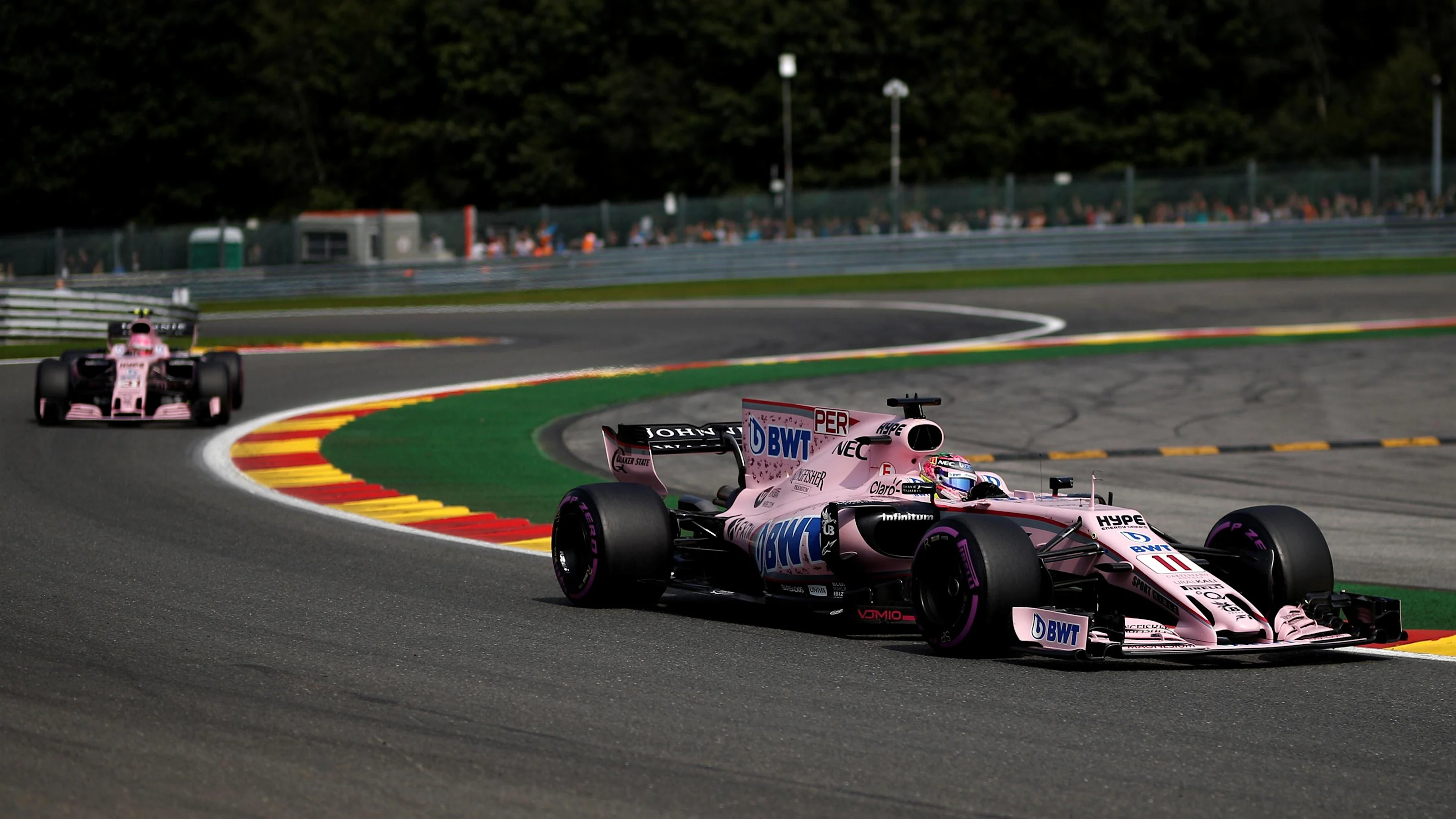 Sergio Perez (MEX) Force India VJM10 and Esteban Ocon (FRA) Force India VJM10 at Formula One World