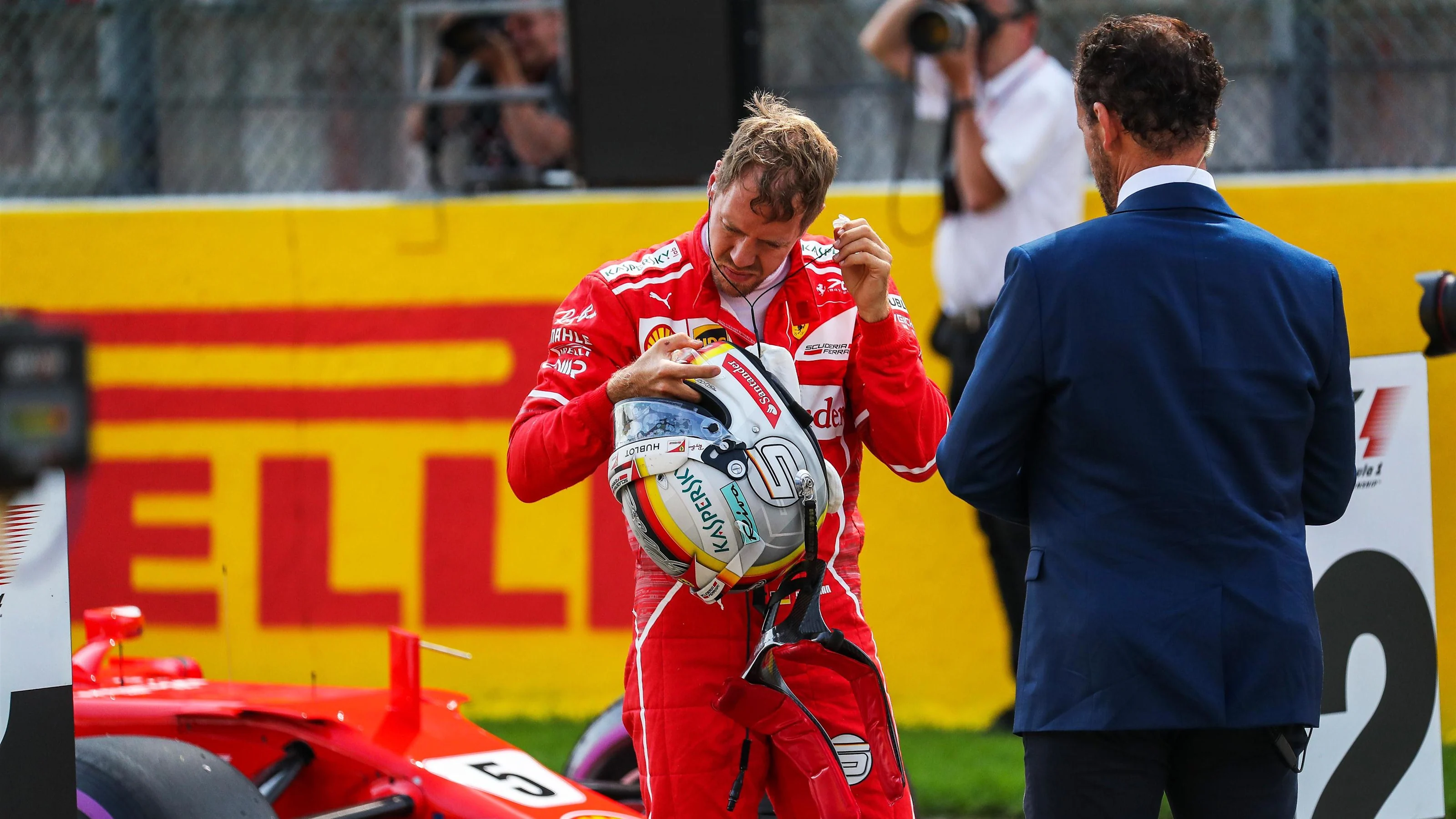Sebastian Vettel (GER) Ferrari in parc ferme at Formula One World Championship, Rd12, Belgian Grand