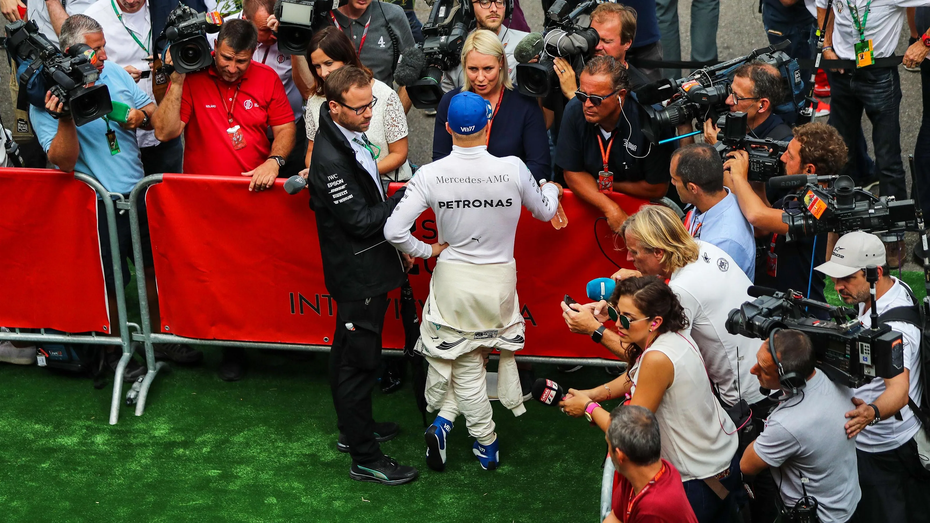 Valtteri Bottas (FIN) Mercedes AMG F1 in the media pen at Formula One World Championship, Rd12,