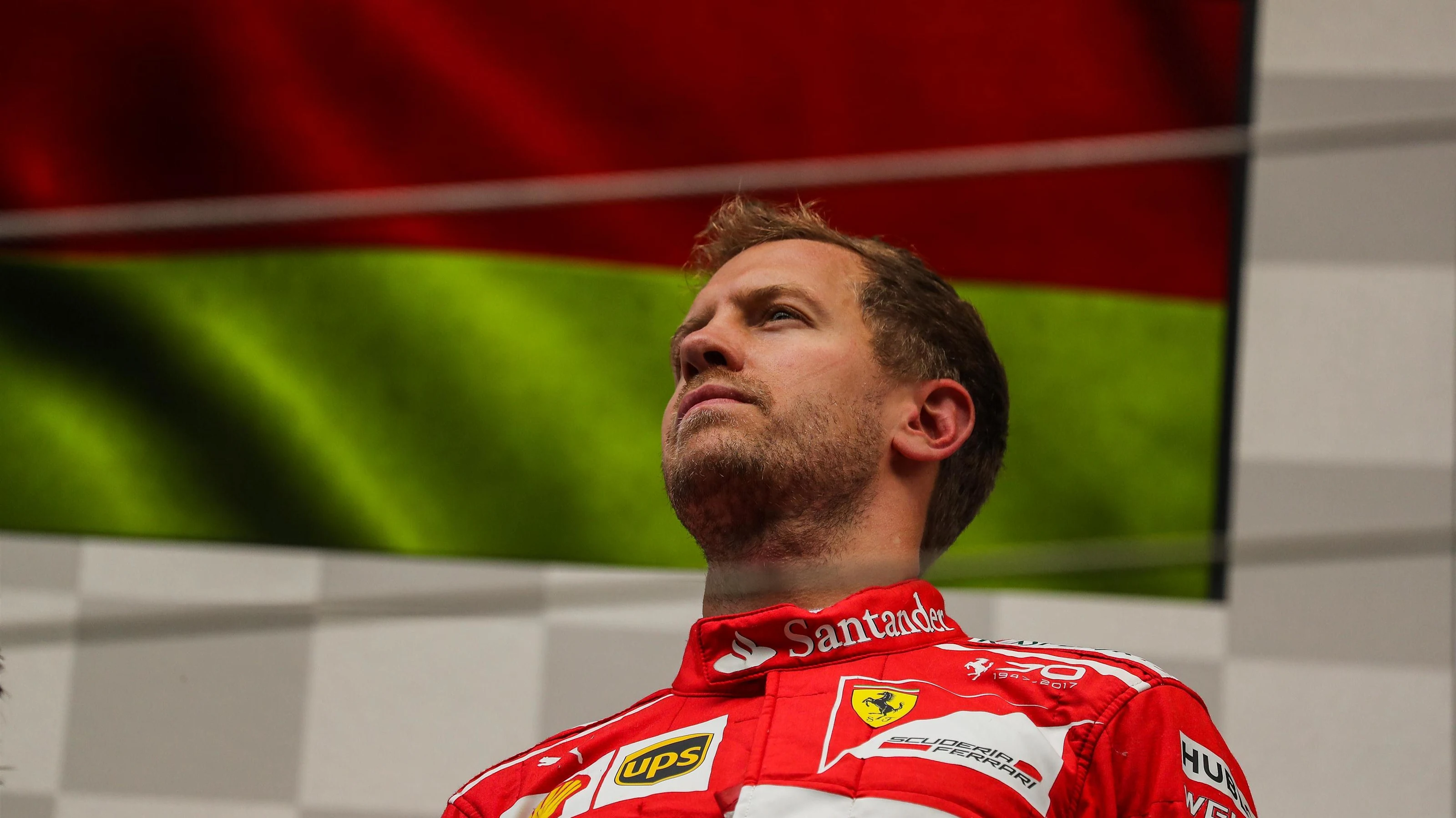 Sebastian Vettel (GER) Ferrari celebrates on the podium at Formula One World Championship, Rd12,