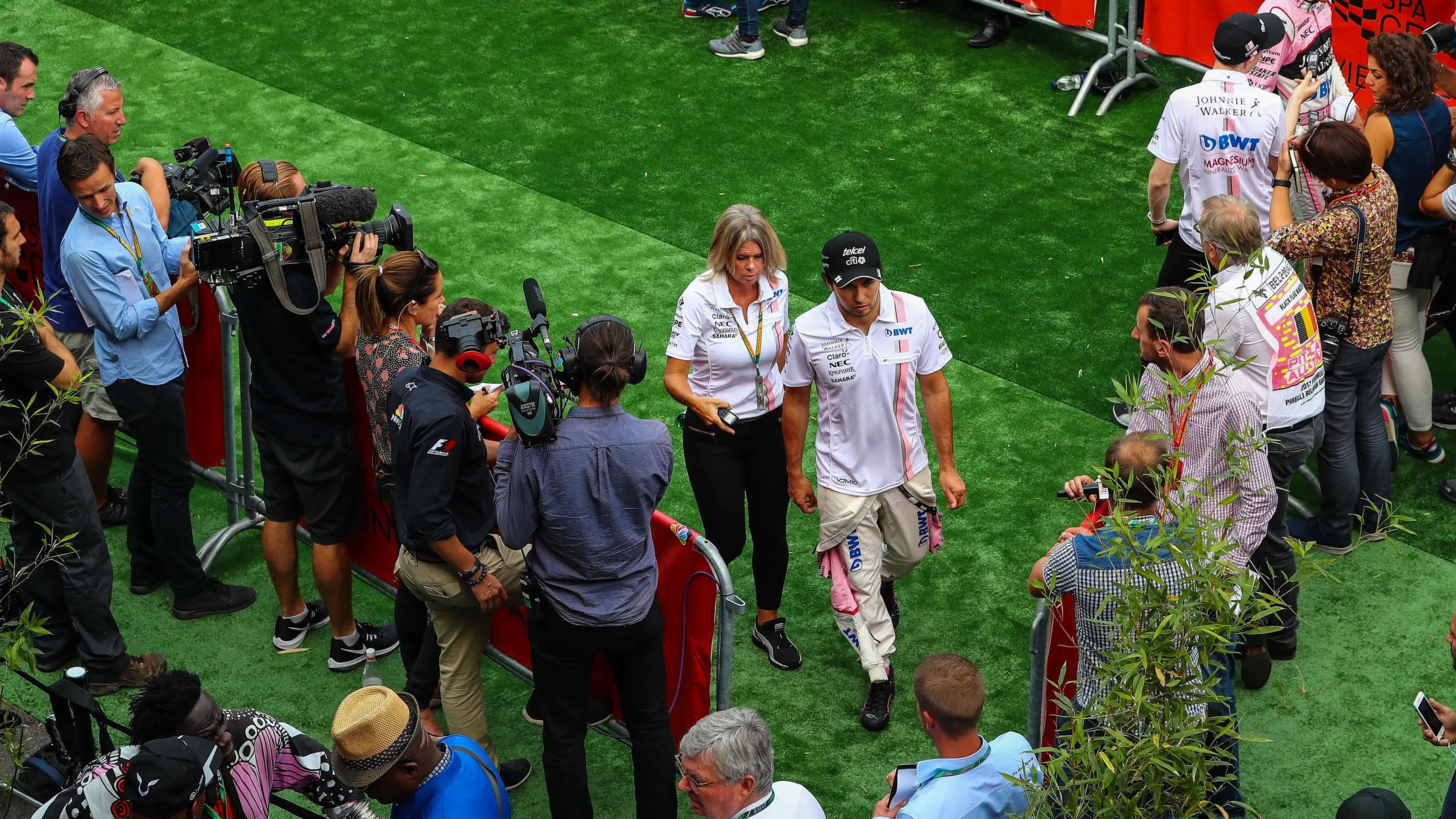 Sergio Perez (MEX) Force India and Esteban Ocon (FRA) Force India in the media interview area at