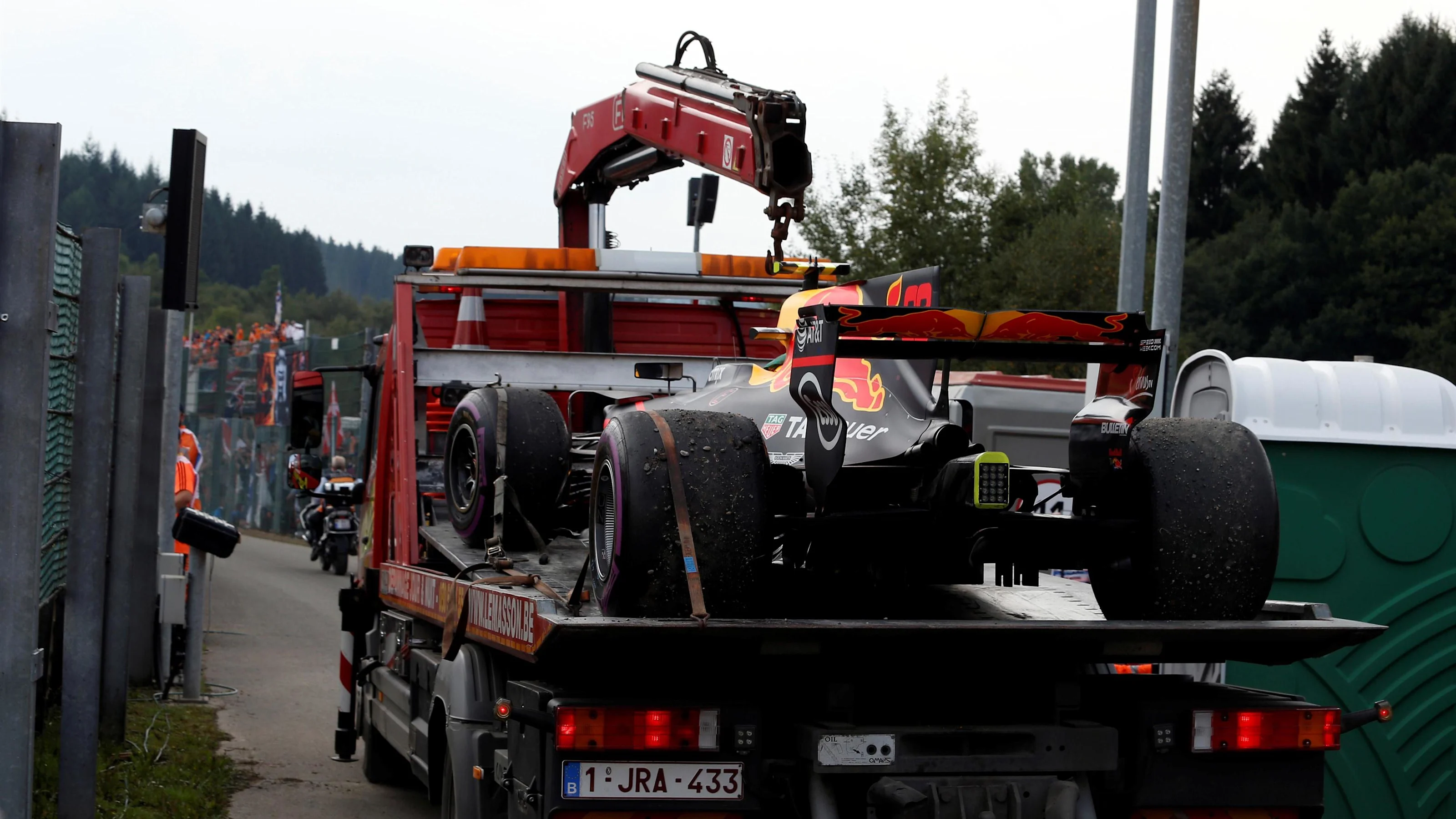 The car of Max Verstappen (NED) Red Bull Racing RB13 is recovered by marshals after stopping on