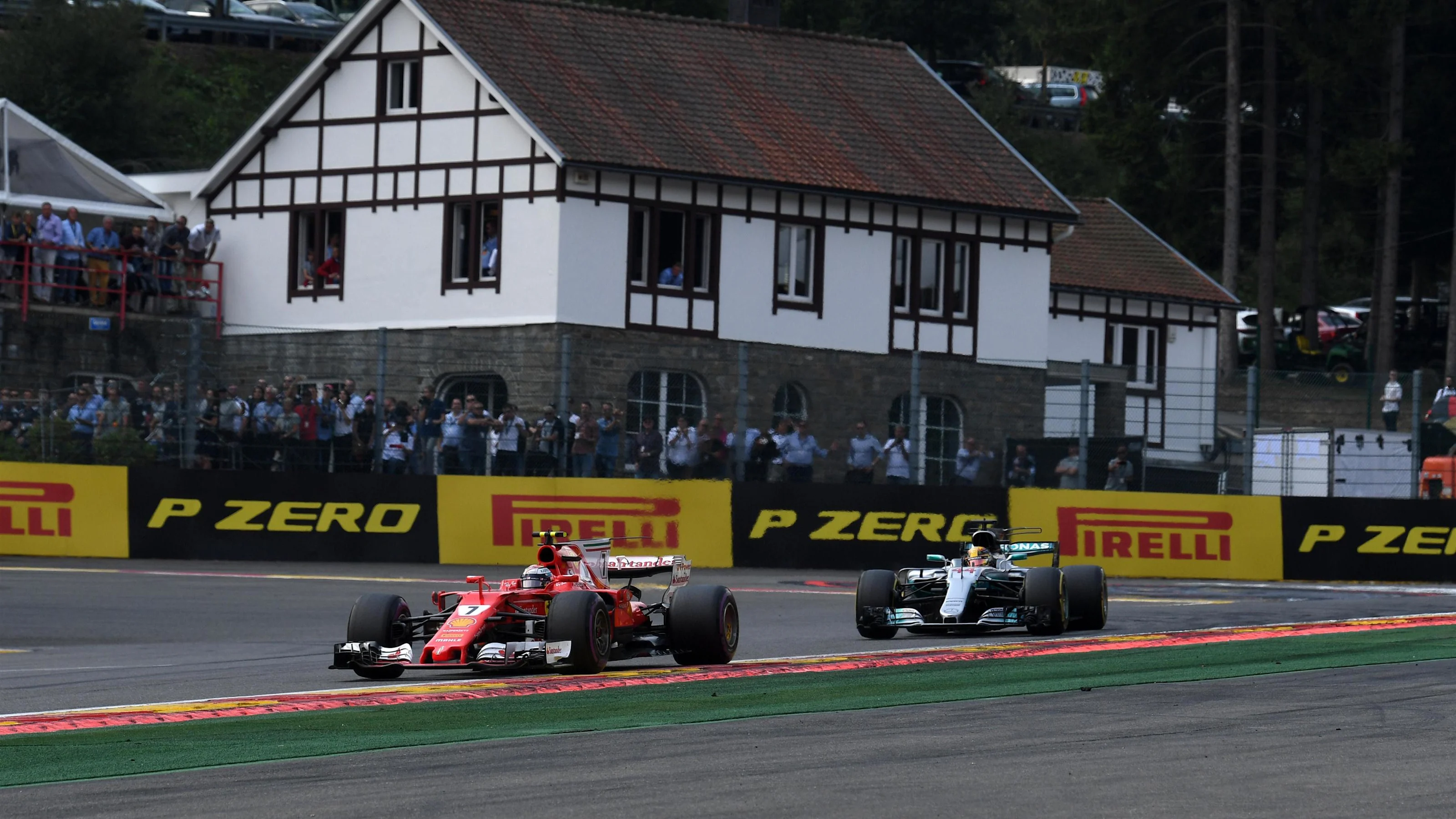 Kimi Raikkonen (FIN) Ferrari SF70-H leads Lewis Hamilton (GBR) Mercedes-Benz F1 W08 Hybrid at