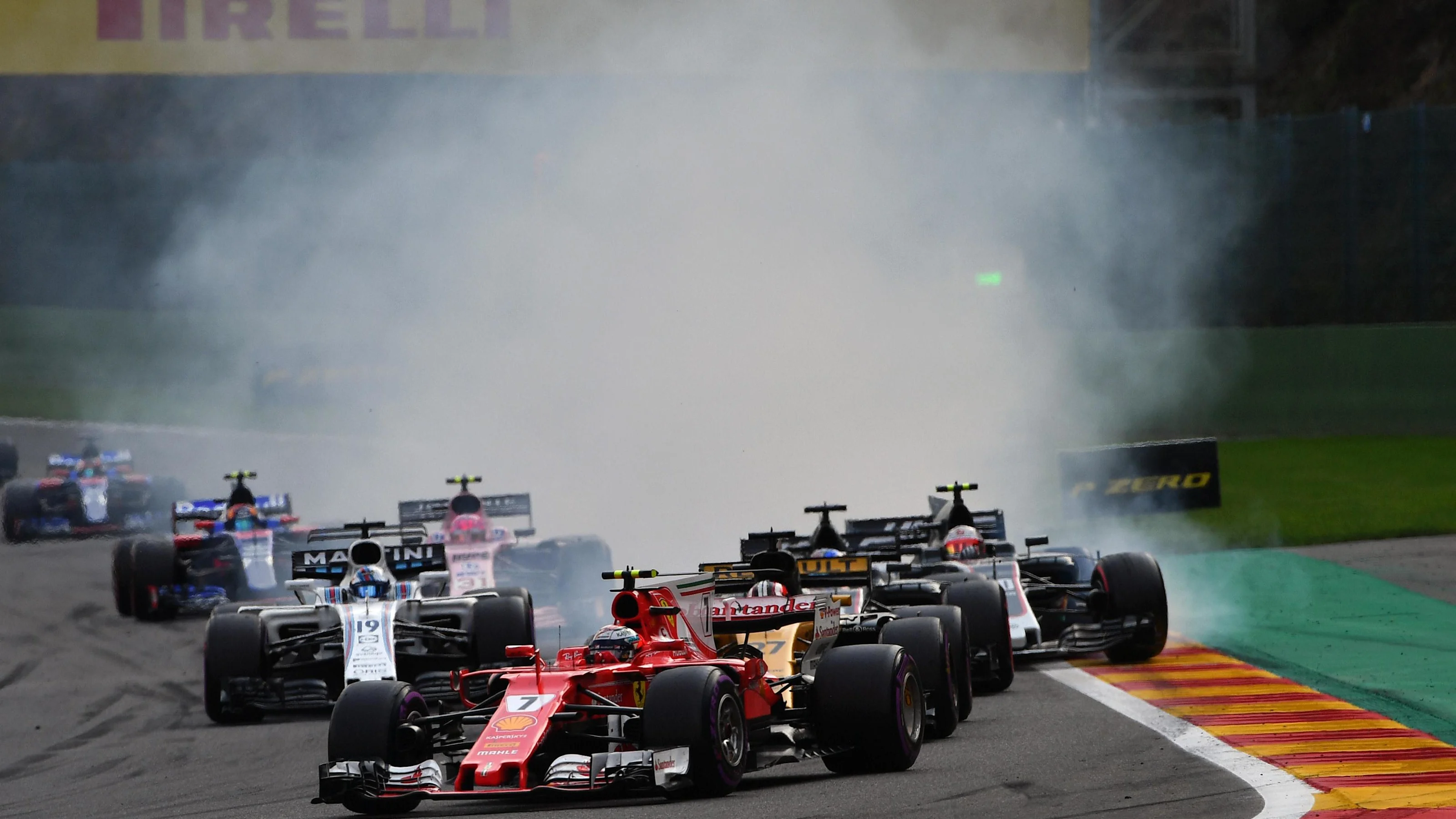 Kevin Magnussen (DEN) Haas VF-17 locks up and runs wide at the restart at Formula One World