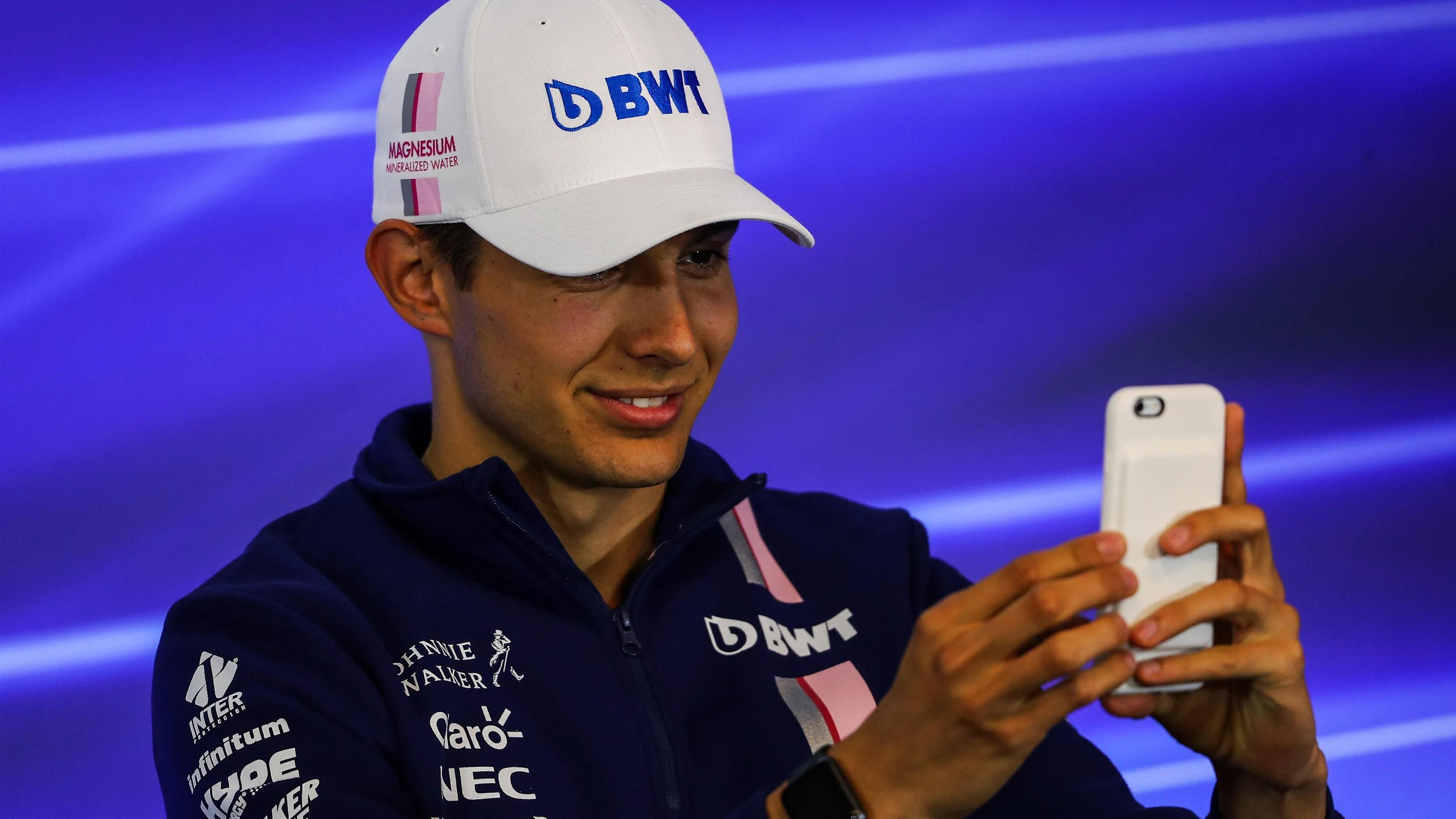Esteban Ocon (FRA) Force India F1 in the Press Conference with phone at Formula One World