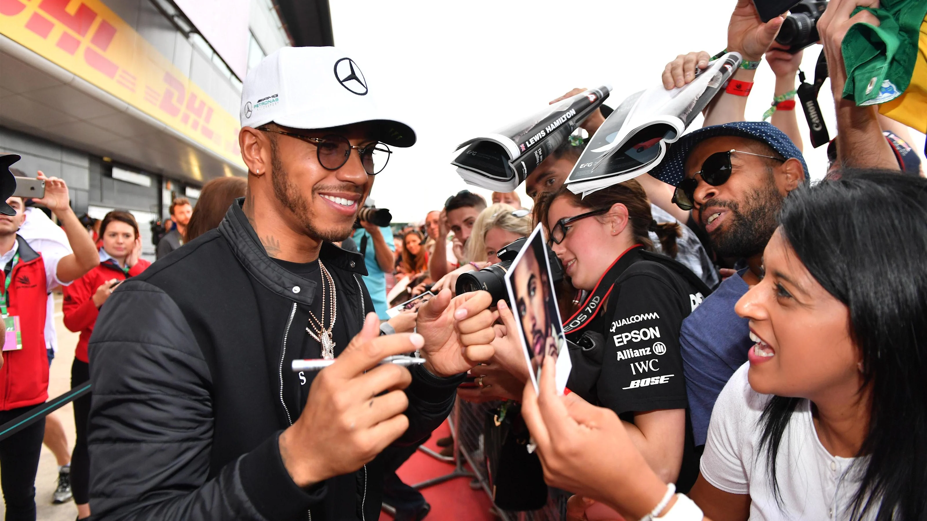 Lewis Hamilton (GBR) Mercedes AMG F1 signs autographs for the fans at Formula One World