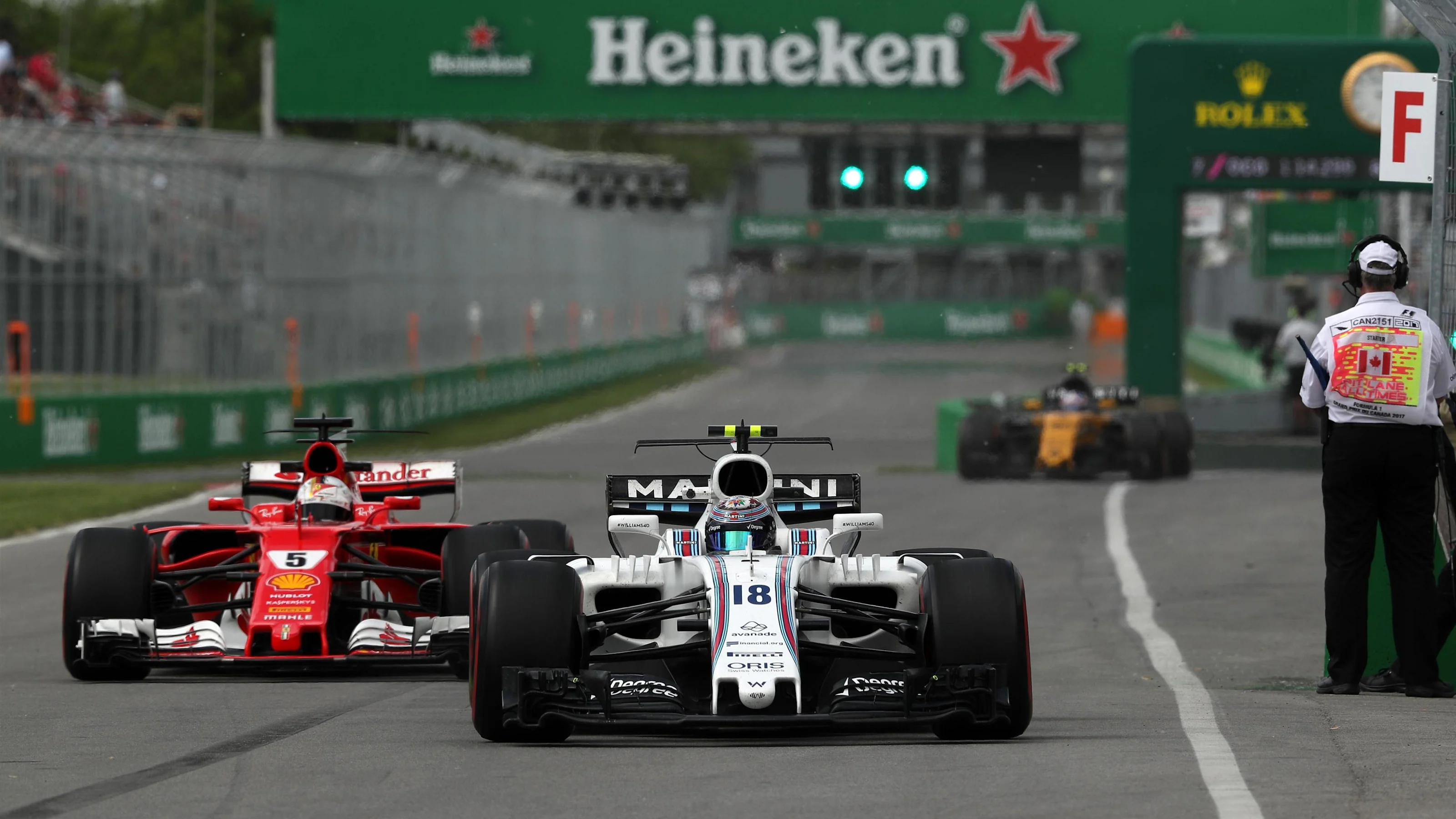 Lance Stroll (CDN) Williams FW40 and Sebastian Vettel (GER) Ferrari SF70-H at Formula One World