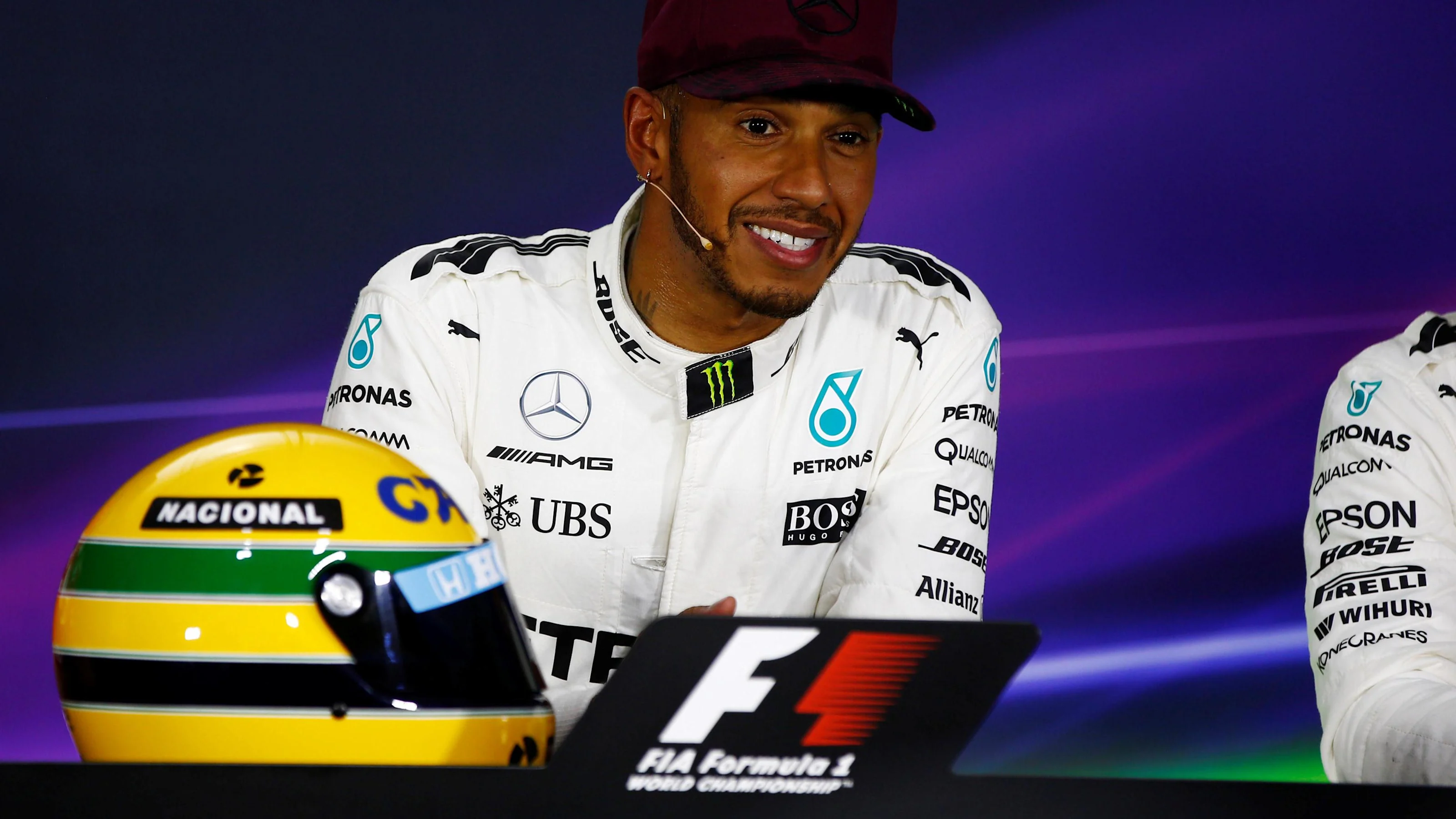 Pole sitter Lewis Hamilton (GBR) Mercedes AMG F1 with the helmet of Ayrton Senna in the Press