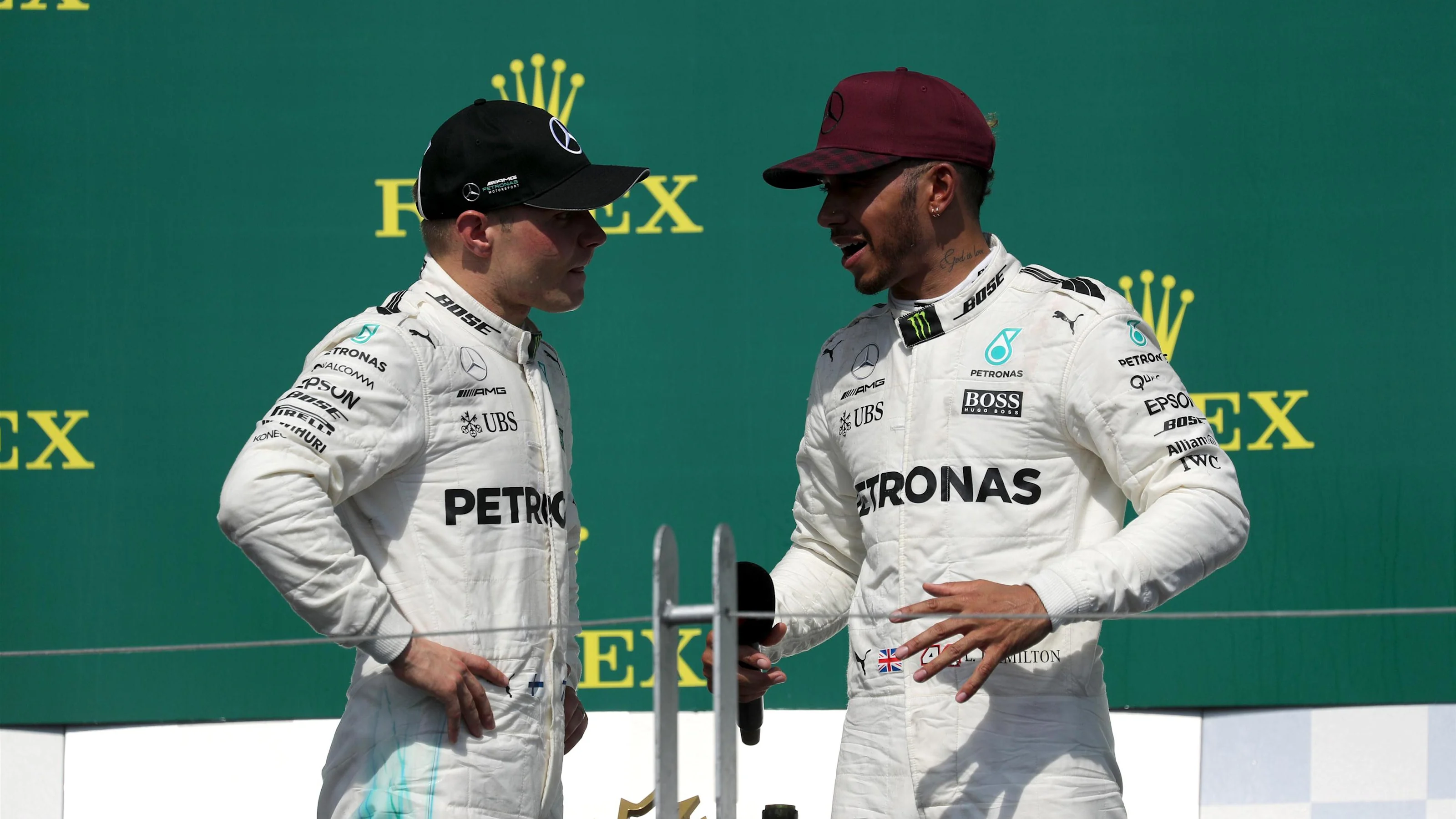 Race winner Lewis Hamilton (GBR) Mercedes AMG F1 celebrates on the podium with Valtteri Bottas