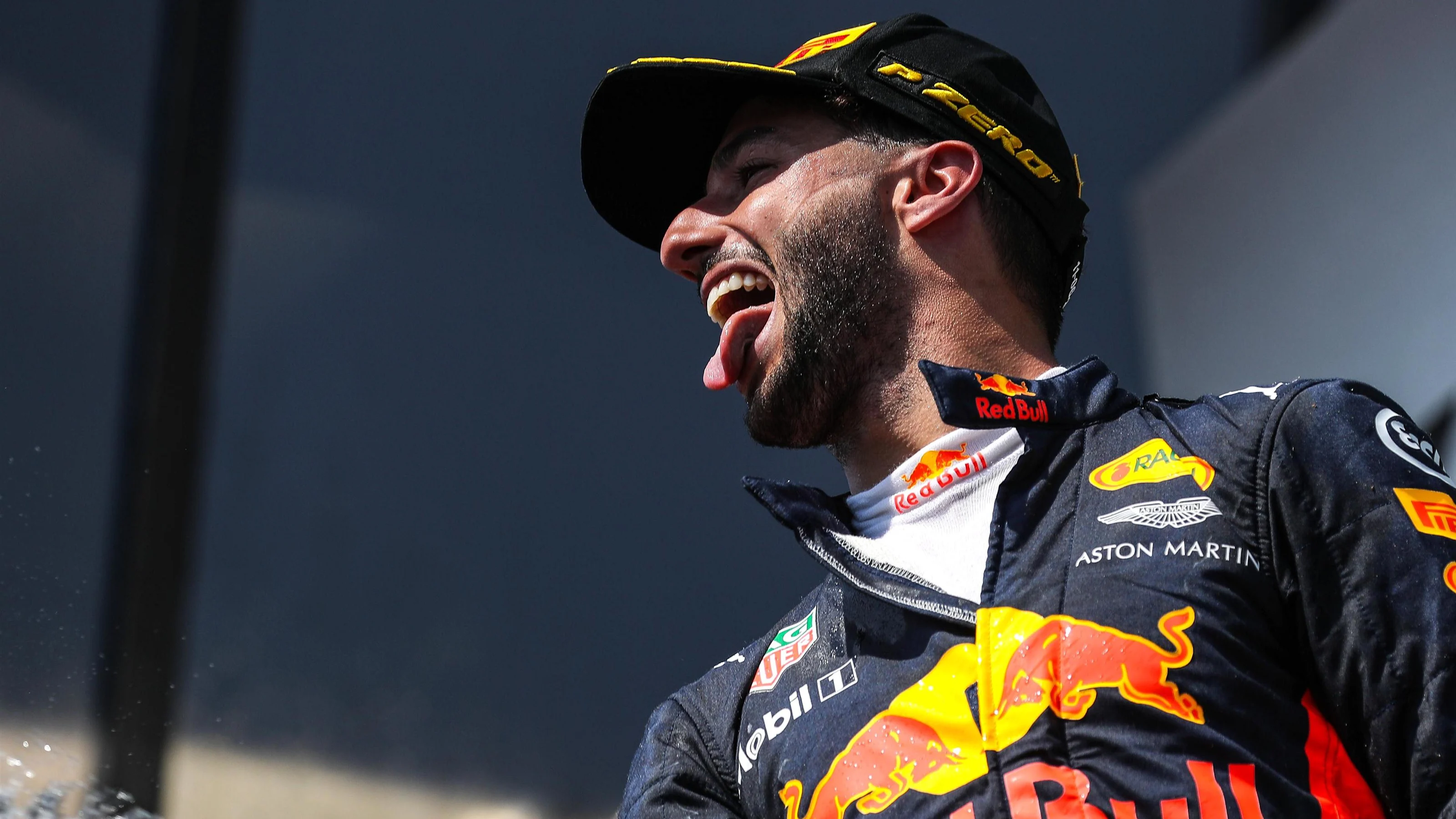 Daniel Ricciardo (AUS) Red Bull Racing celebrates on the podium with the champagne at Formula One