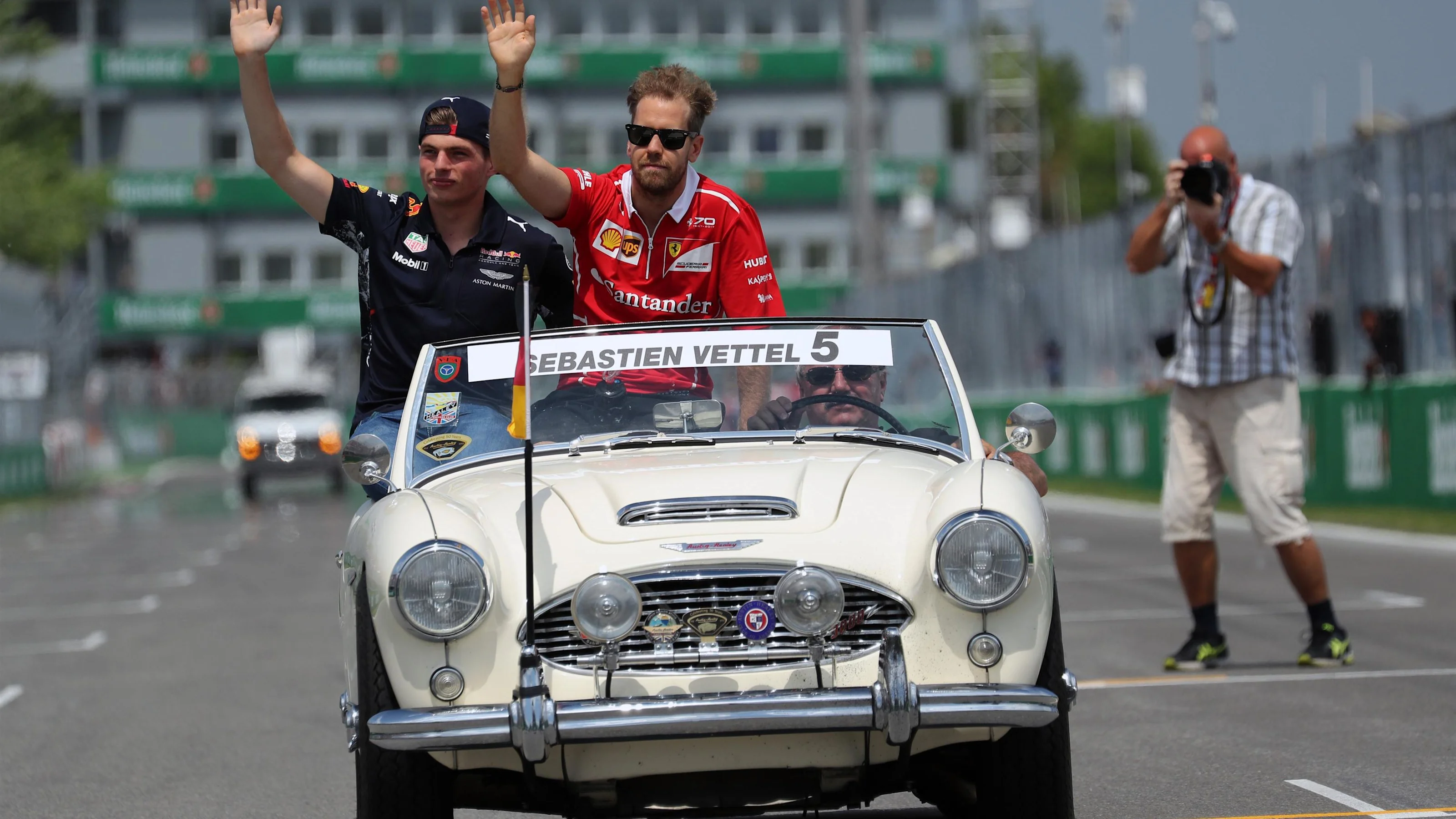 Max Verstappen (NED) Red Bull Racing and Sebastian Vettel (GER) Ferrari on the drivers parade at