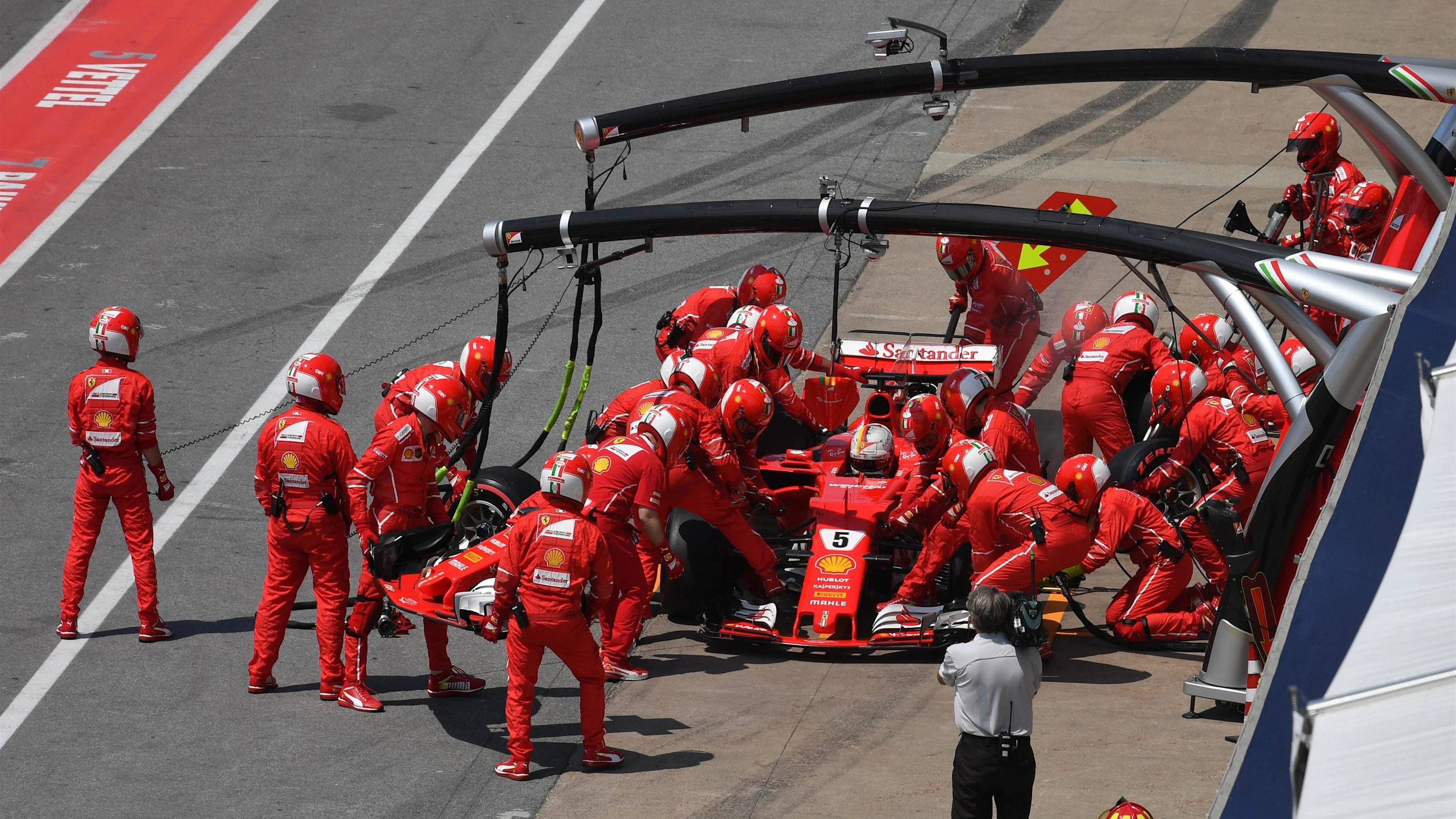 Sebastian Vettel (GER) Ferrari SF70-H pits with a broken front wing at Formula One World