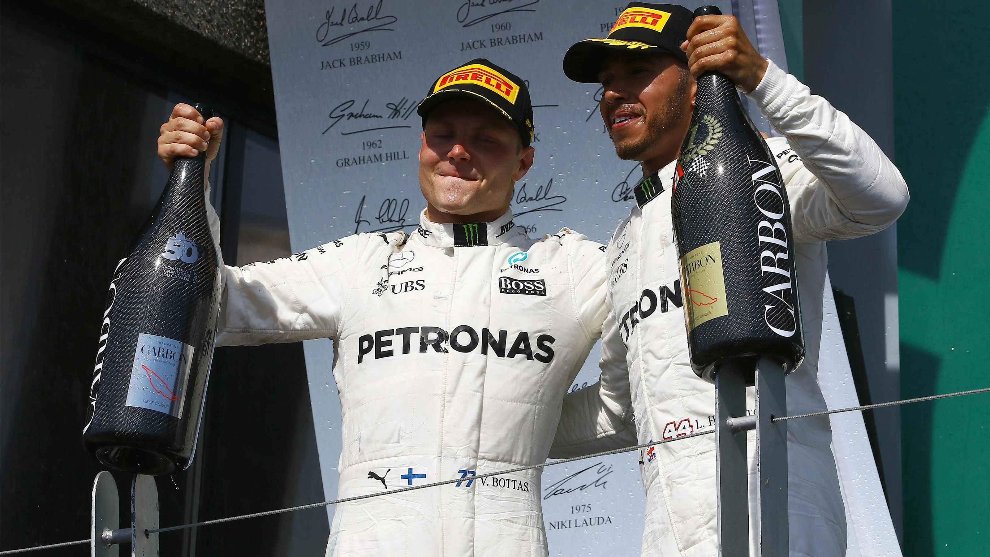 Valtteri Bottas (FIN) Mercedes AMG F1 and Lewis Hamilton (GBR) Mercedes AMG F1 celebrate on the
