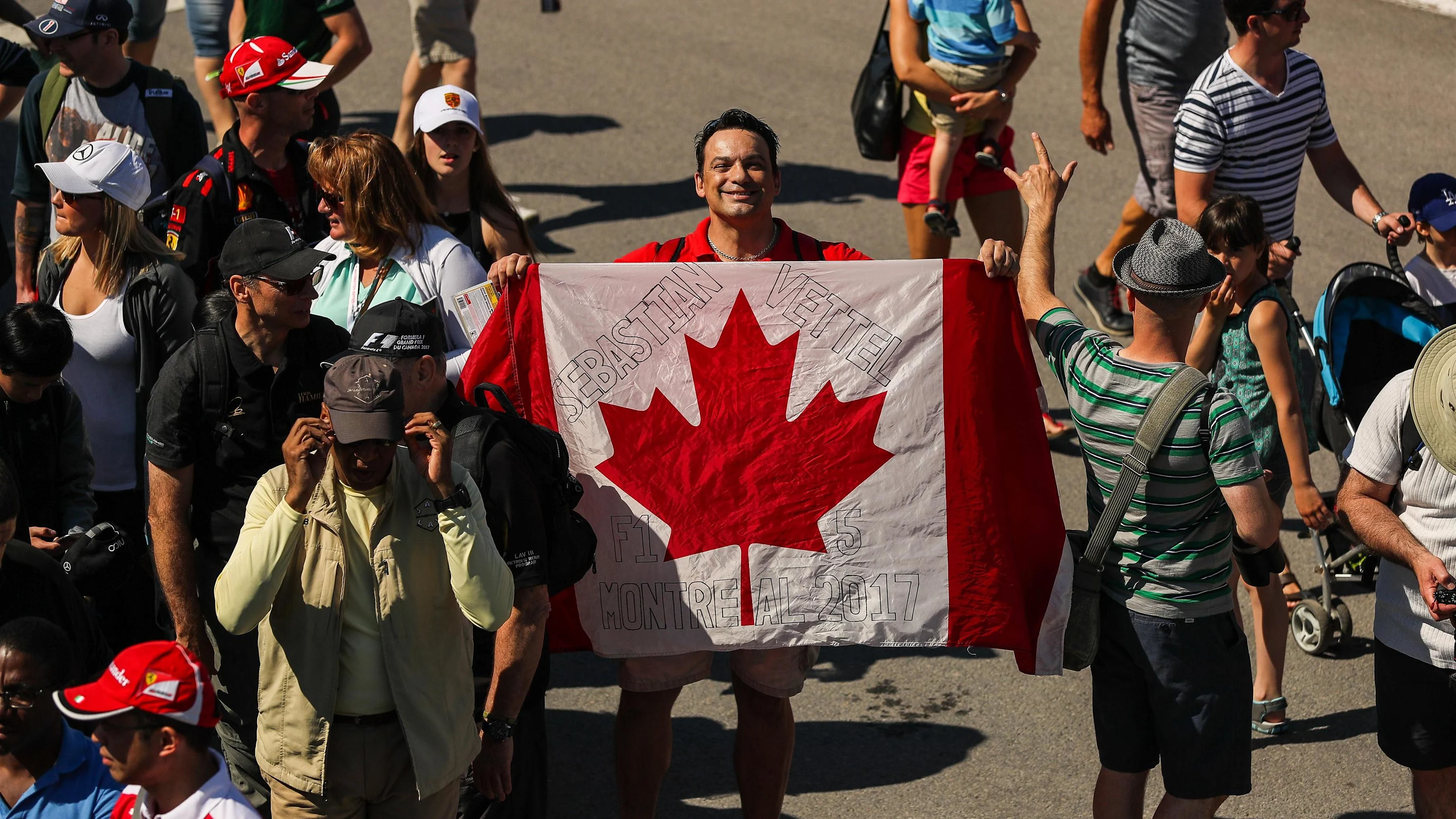 Fan with Canadian flag and atmosphere at Formula One World Championship, Rd7, Canadian Grand Prix,