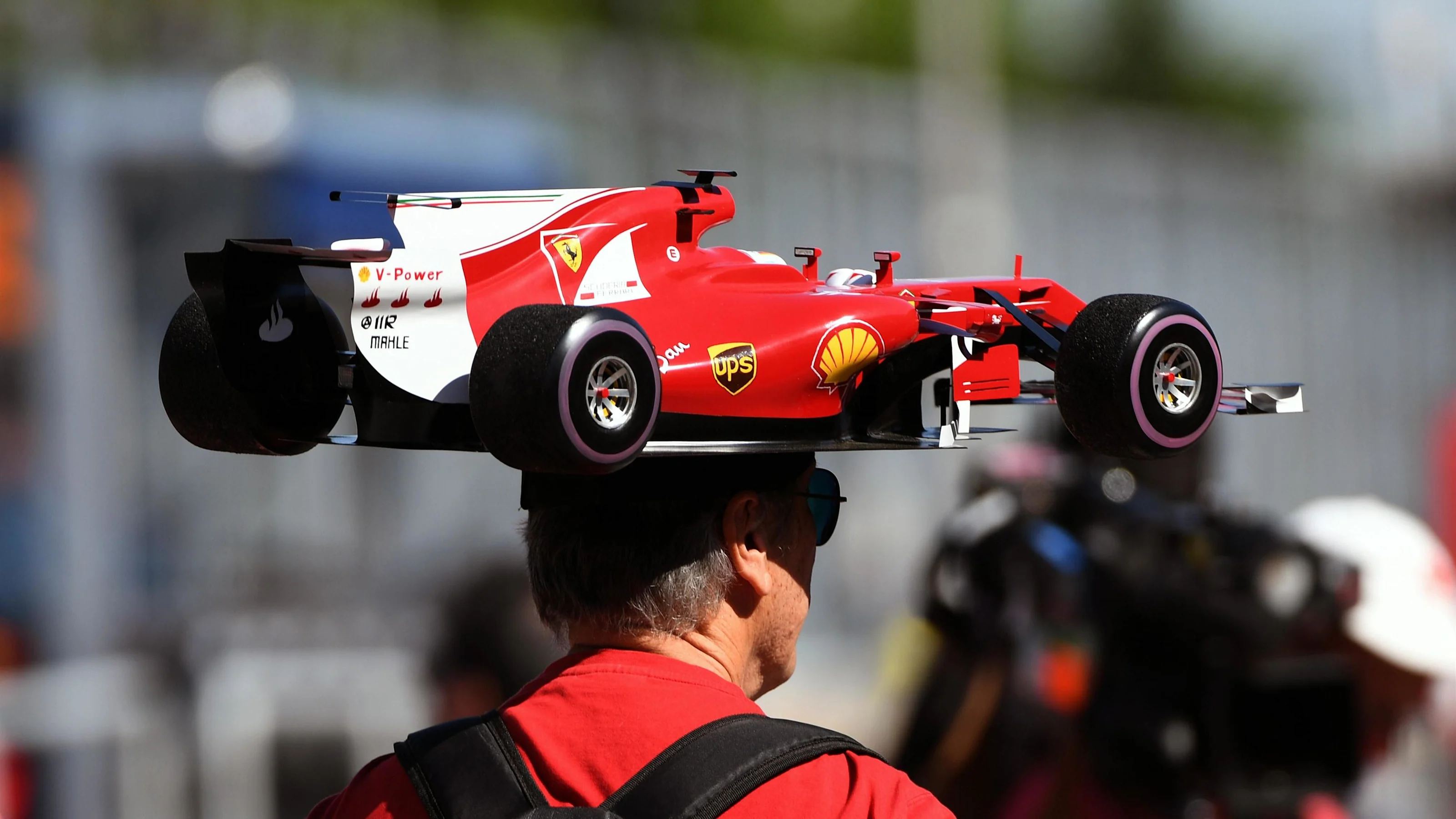 Fan with Ferrari car hat at Formula One World Championship, Rd7, Canadian Grand Prix, Preparations,