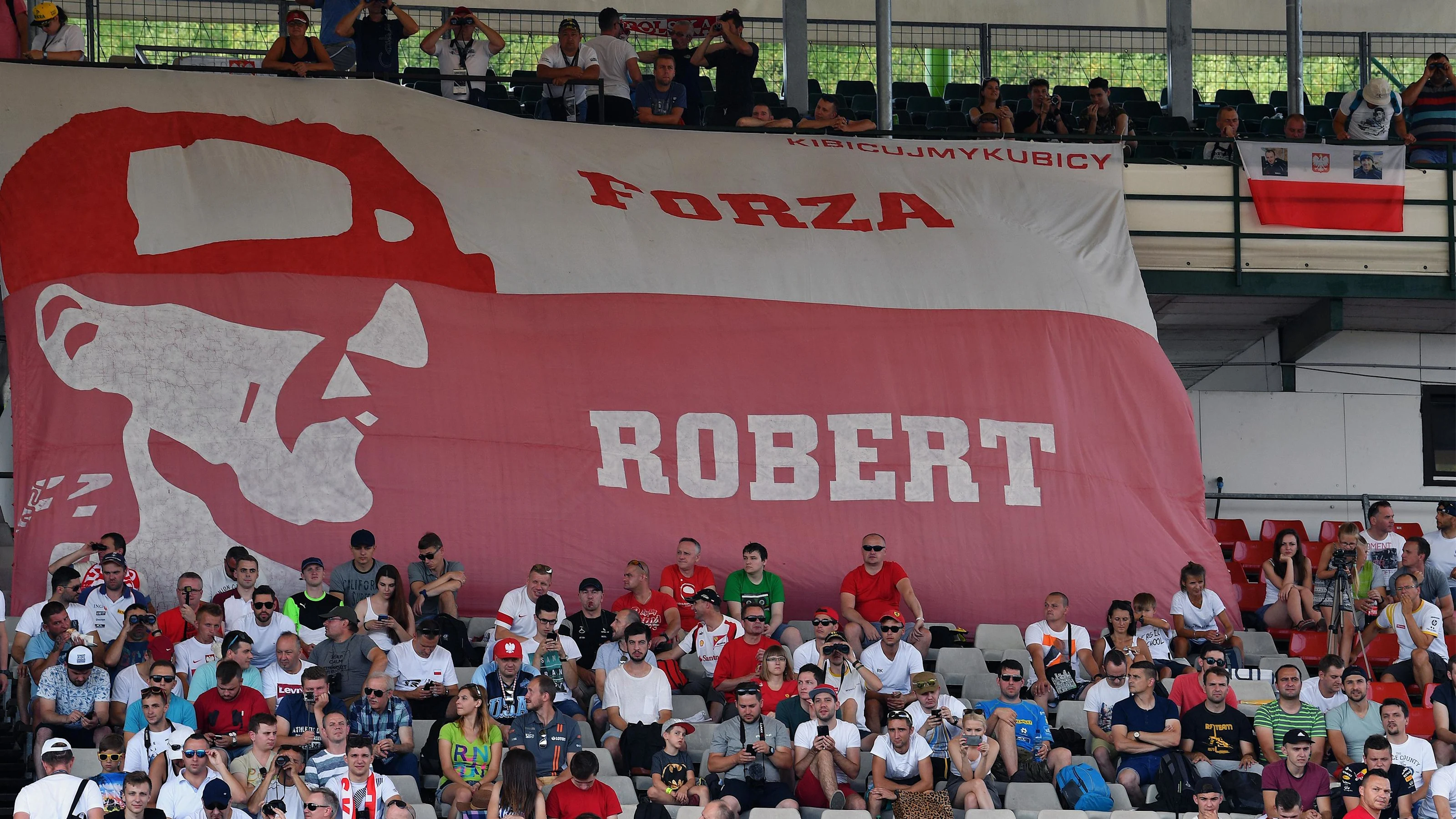Robert Kubica (POL) Renault Sport F1 Team fans and banners at Formula One Testing, Day Two,