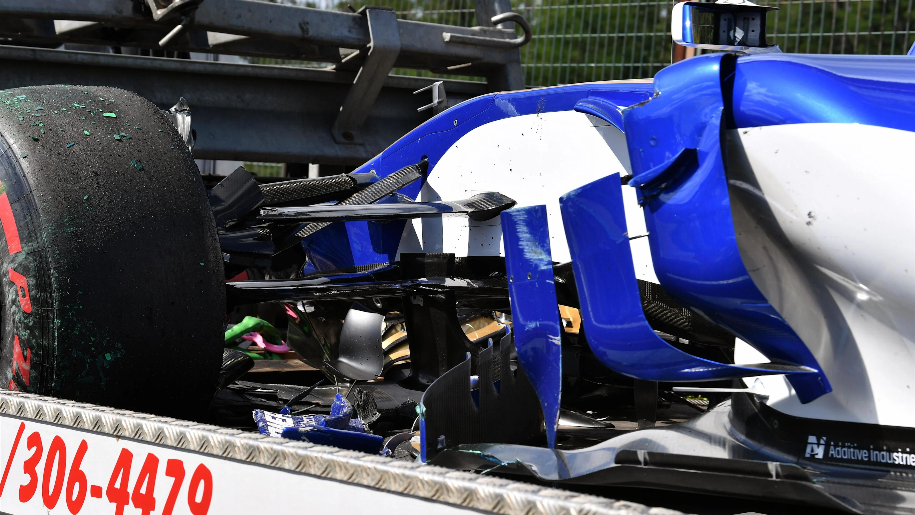 The crashed car of Pascal Wehrlein (GER) Sauber C36 is recovered in FP2 at Formula One World