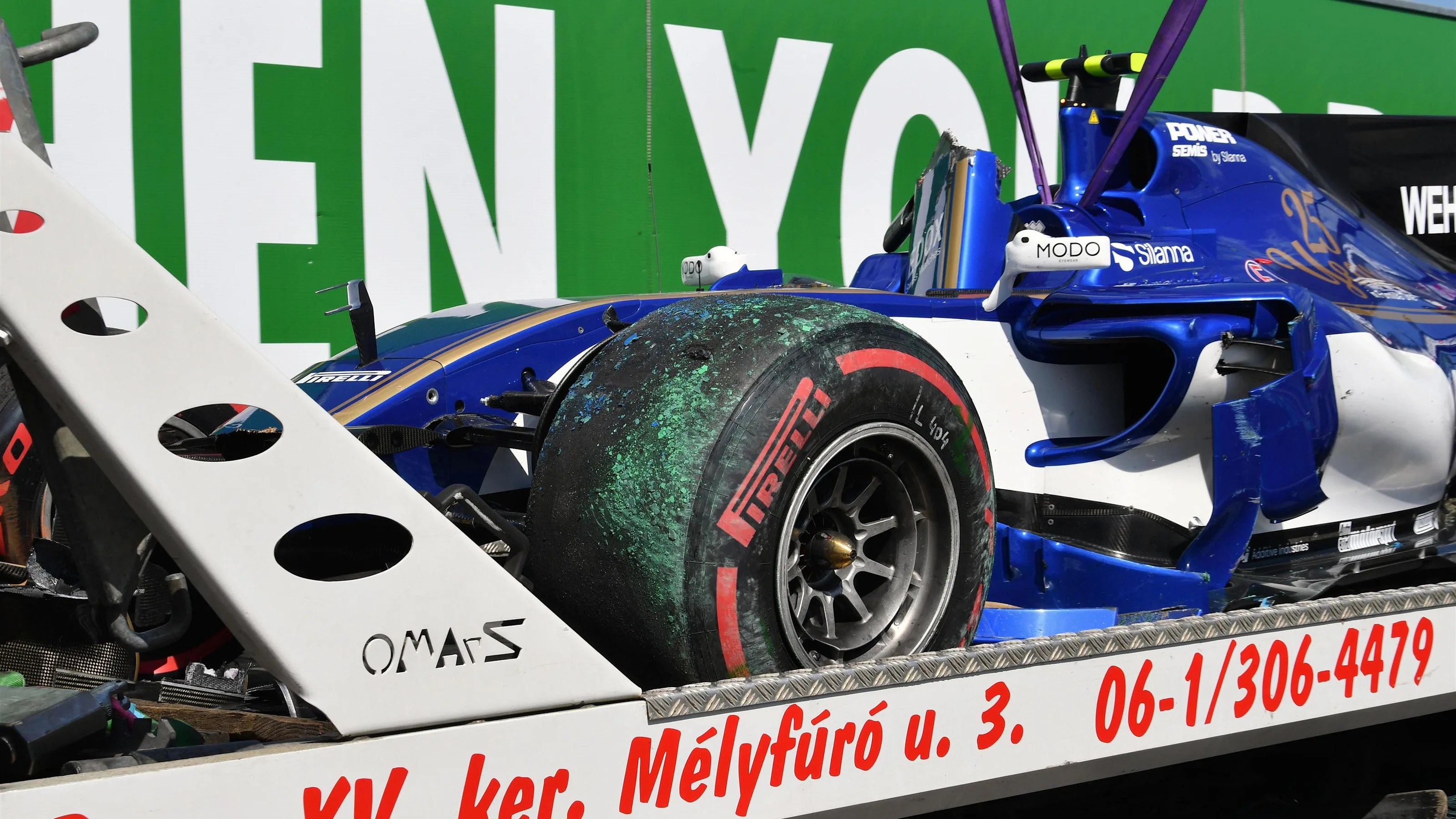 The crashed car of Pascal Wehrlein (GER) Sauber C36 is recovered in FP2 at Formula One World