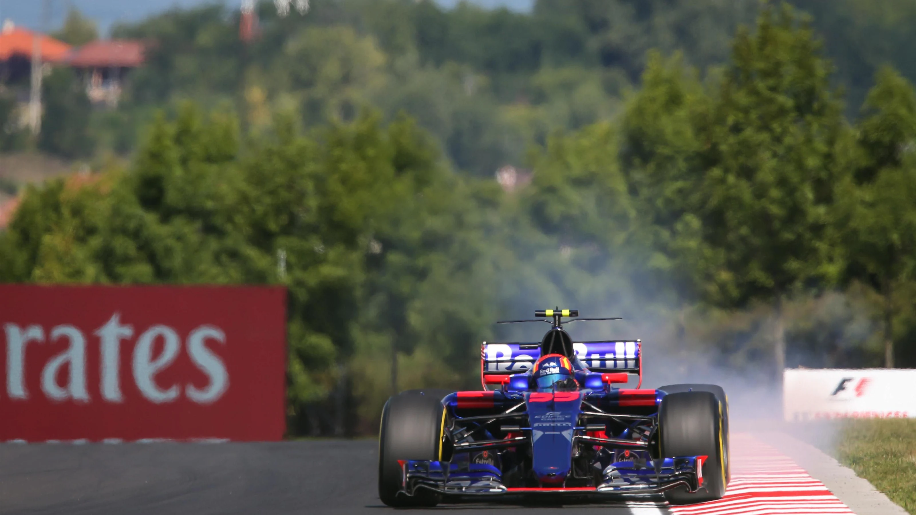 Carlos Sainz jr (ESP) Scuderia Toro Rosso STR12 locks up at Formula One World Championship, Rd11,