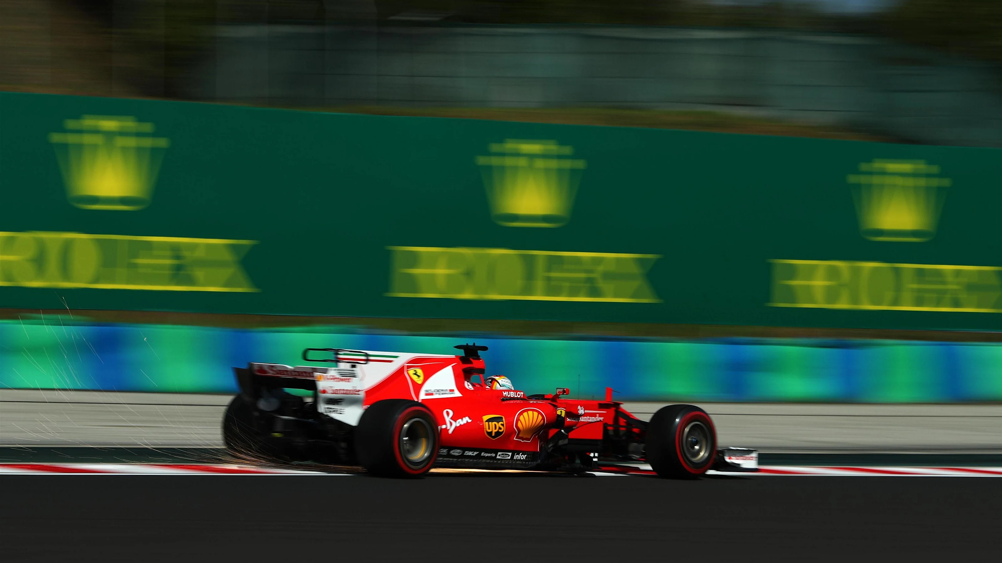 Sebastian Vettel (GER) Ferrari SF70-H sparks at Formula One World Championship, Rd11, Hungarian
