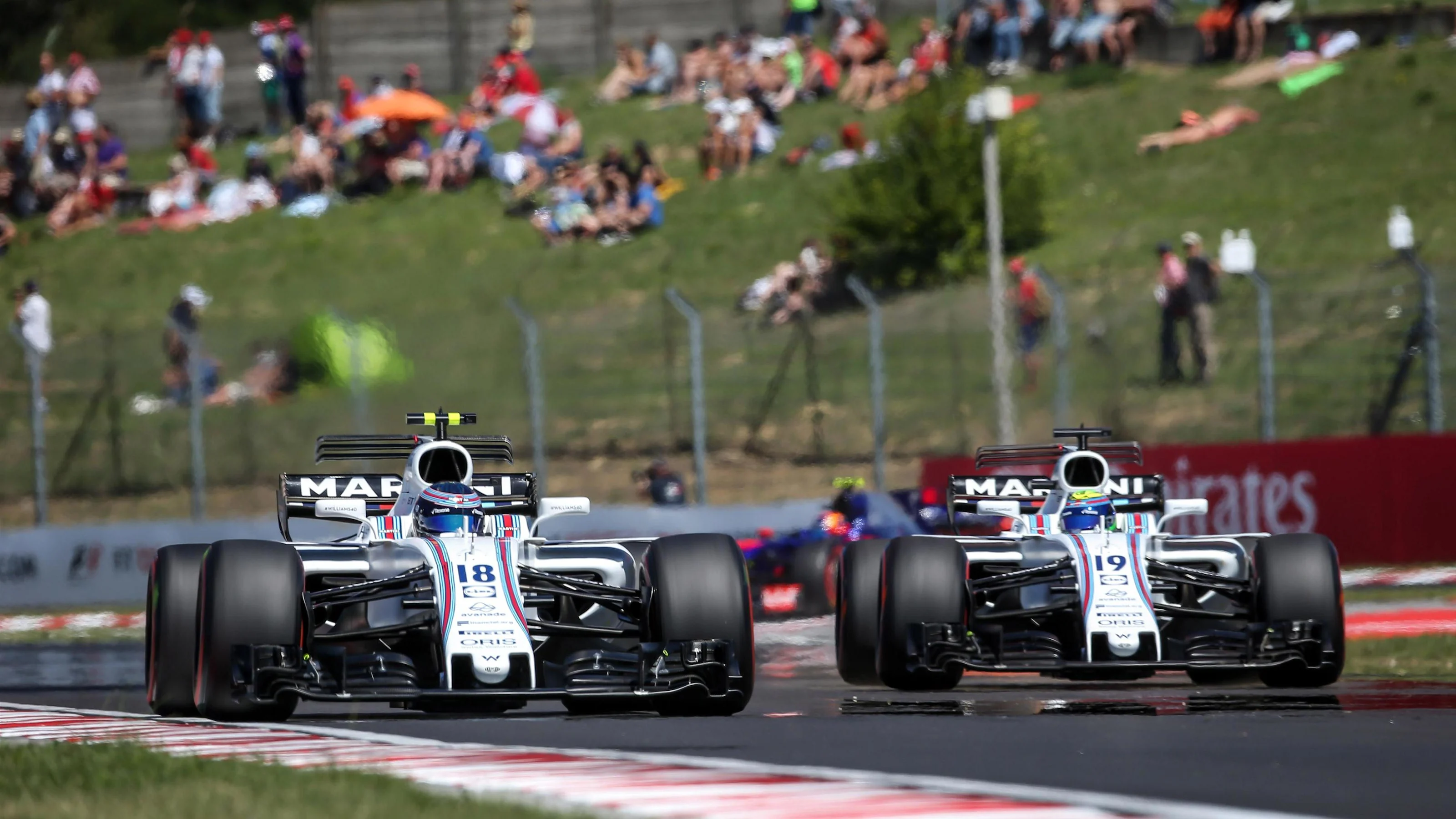 Lance Stroll (CDN) Williams FW40 and Felipe Massa (BRA) Williams FW40 at Formula One World