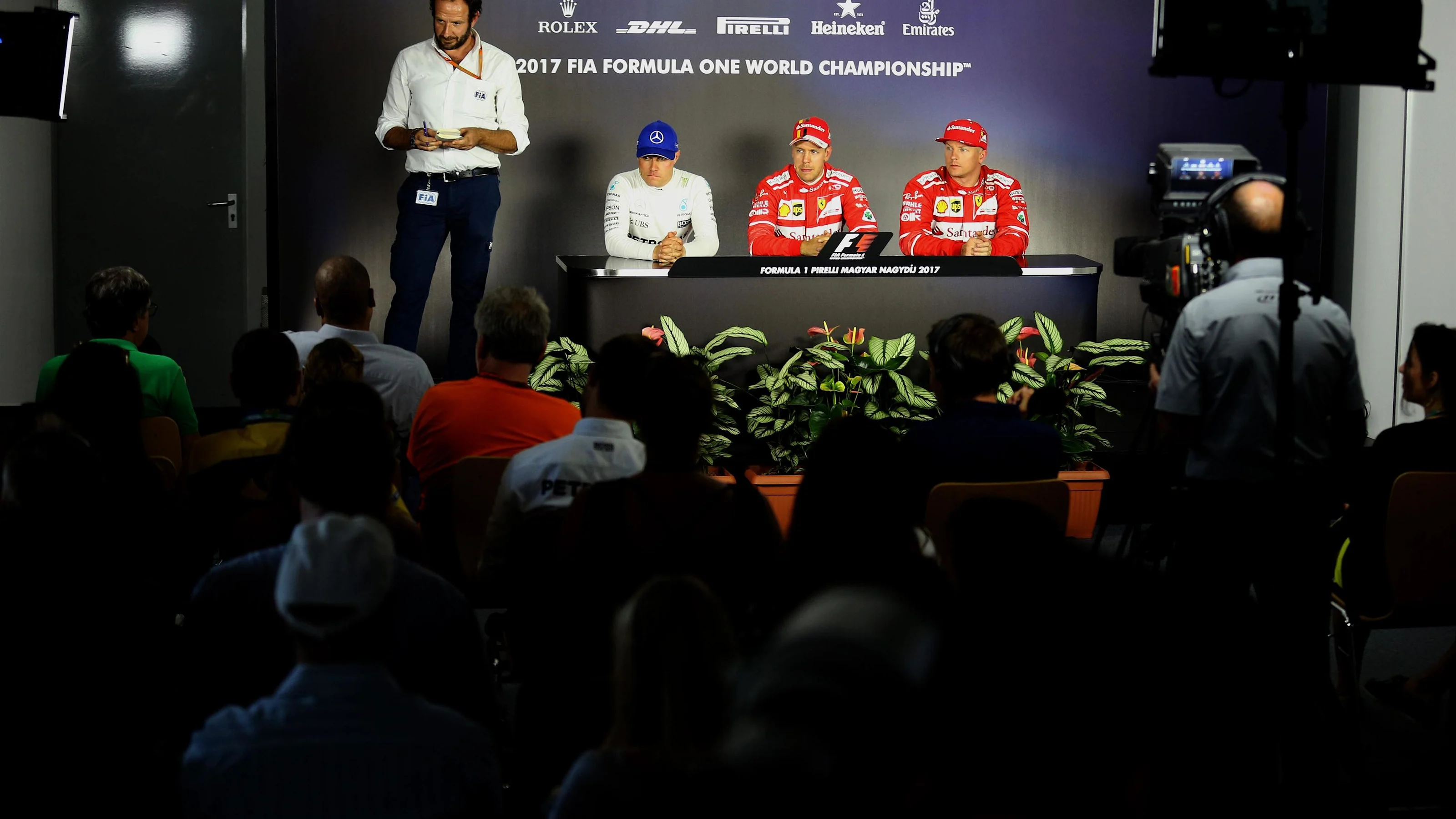 Matteo Bonciani (ITA) FIA Media Delegate, Valtteri Bottas (FIN) Mercedes AMG F1, Pole sitter