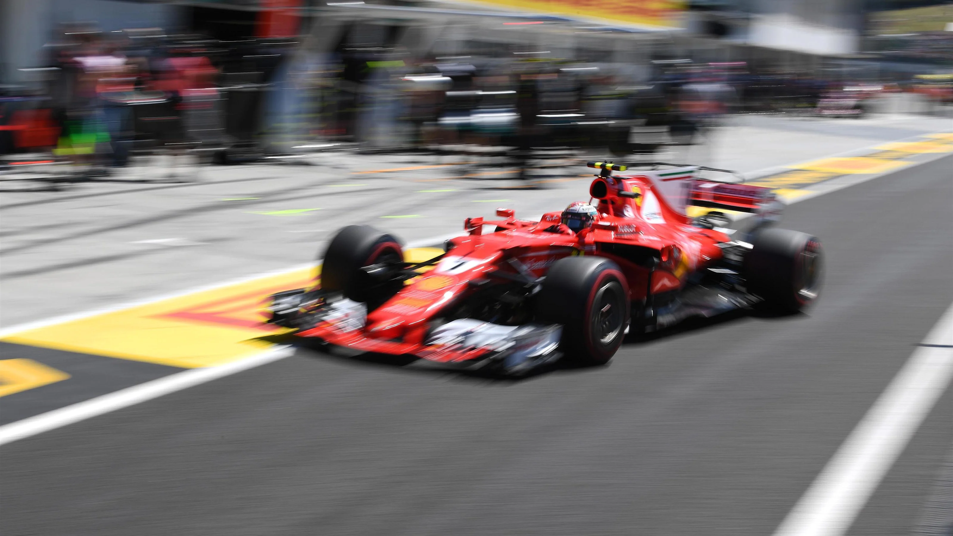 Kimi Raikkonen (FIN) Ferrari SF70-H pit stop at Formula One World Championship, Rd11, Hungarian