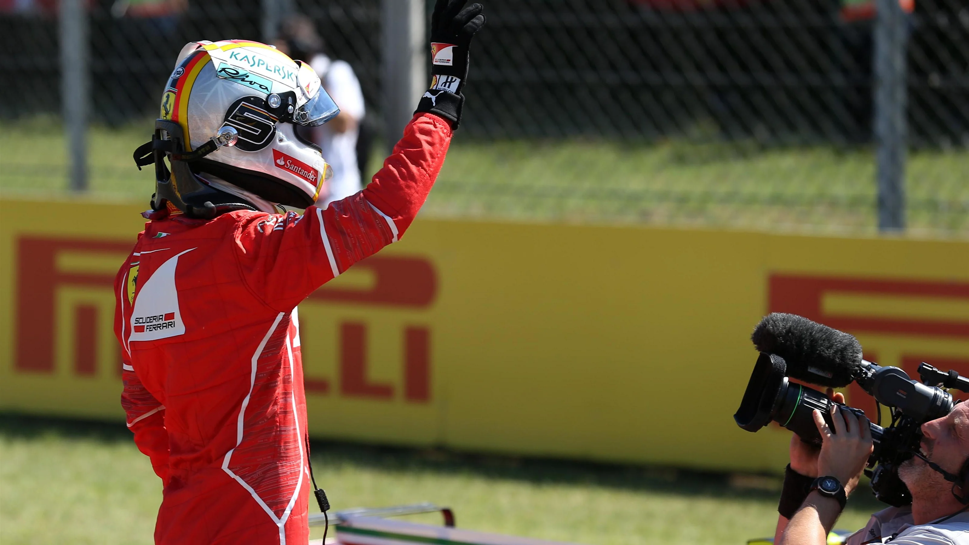 Pole sitter Sebastian Vettel (GER) Ferrari celebrates in parc ferme at Formula One World