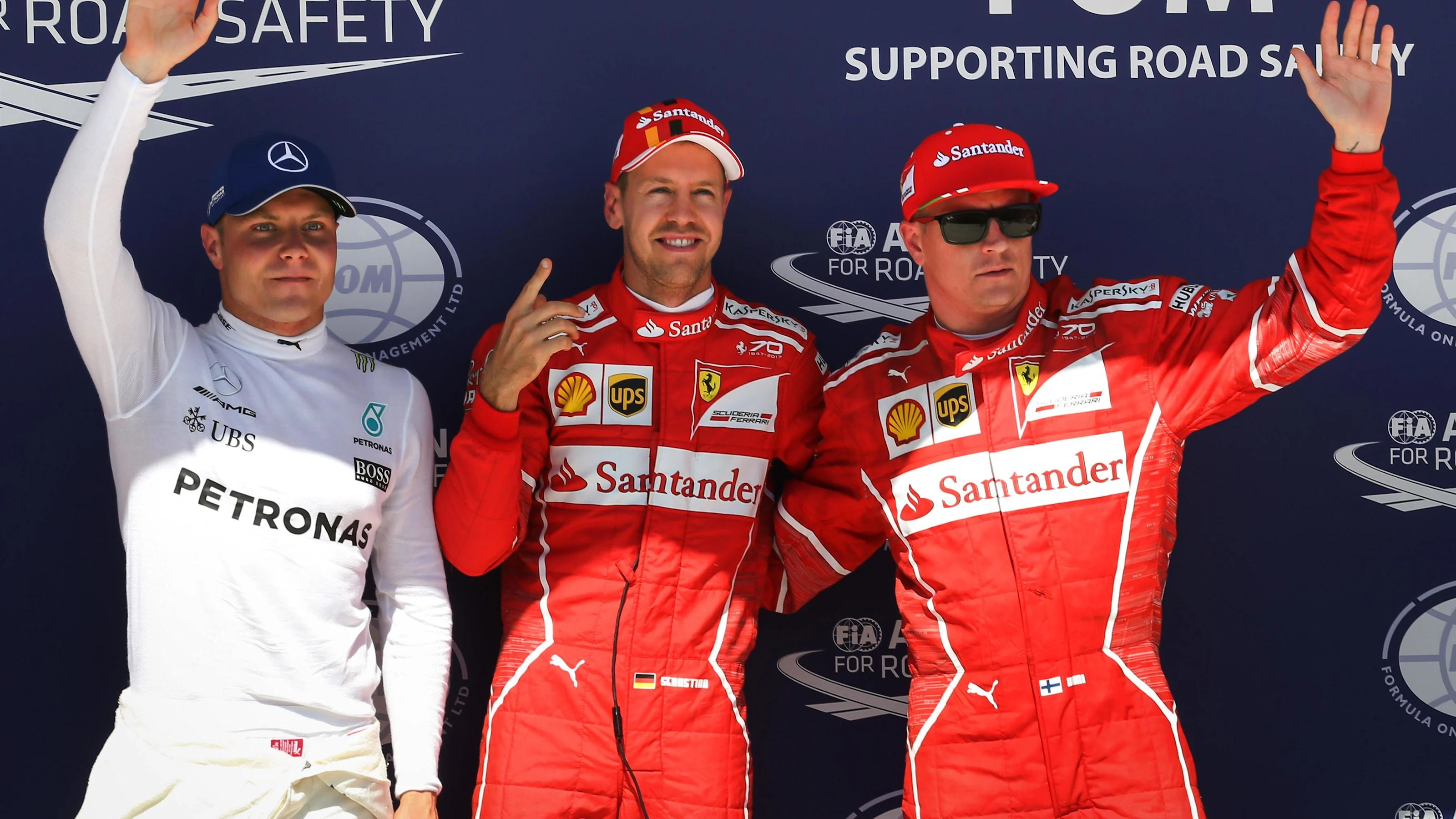 (L to R): Valtteri Bottas (FIN) Mercedes AMG F1, pole sitter Sebastian Vettel (GER) Ferrari and